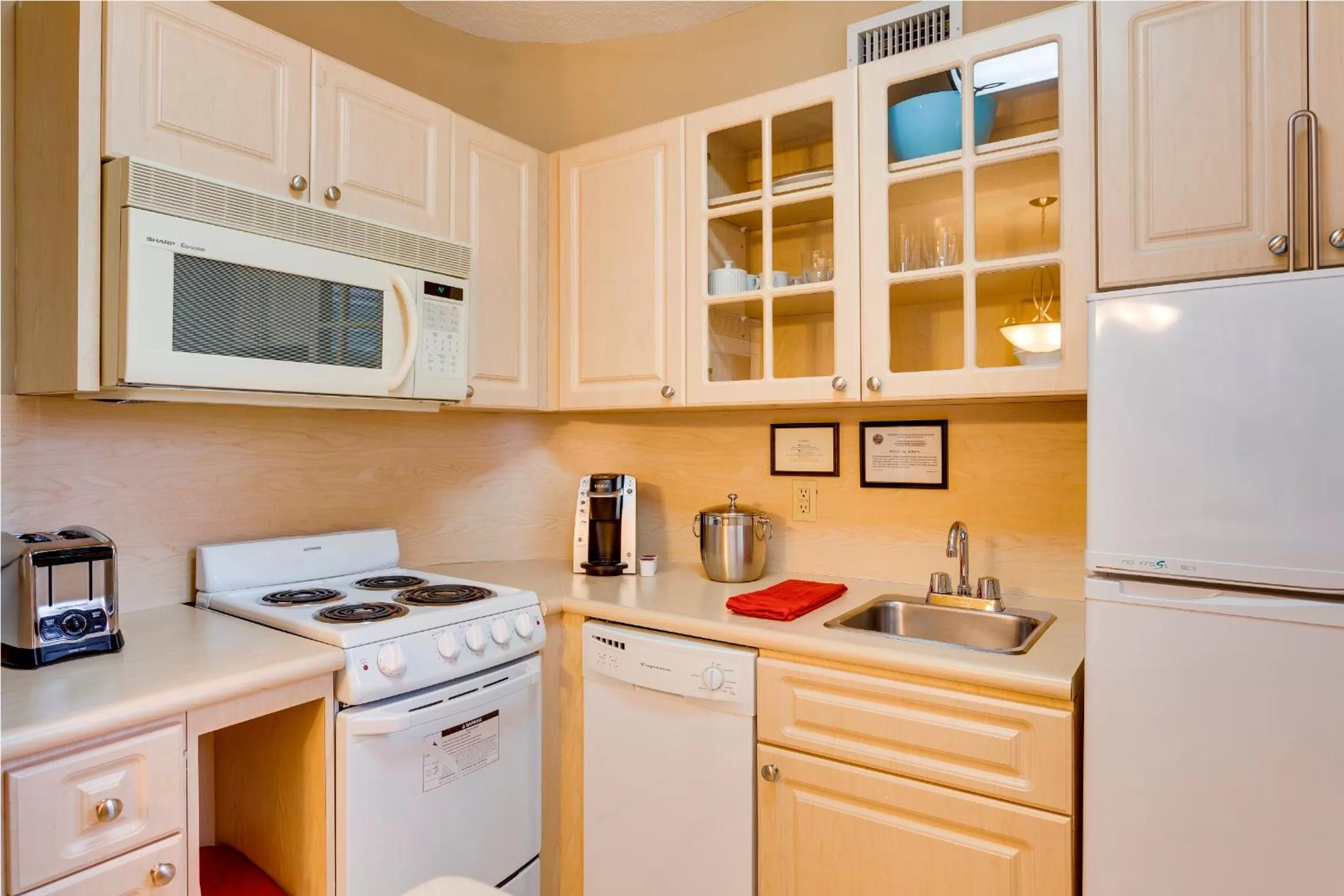 Kitchen or kitchenette in Sun Harbour Boutique Hotel