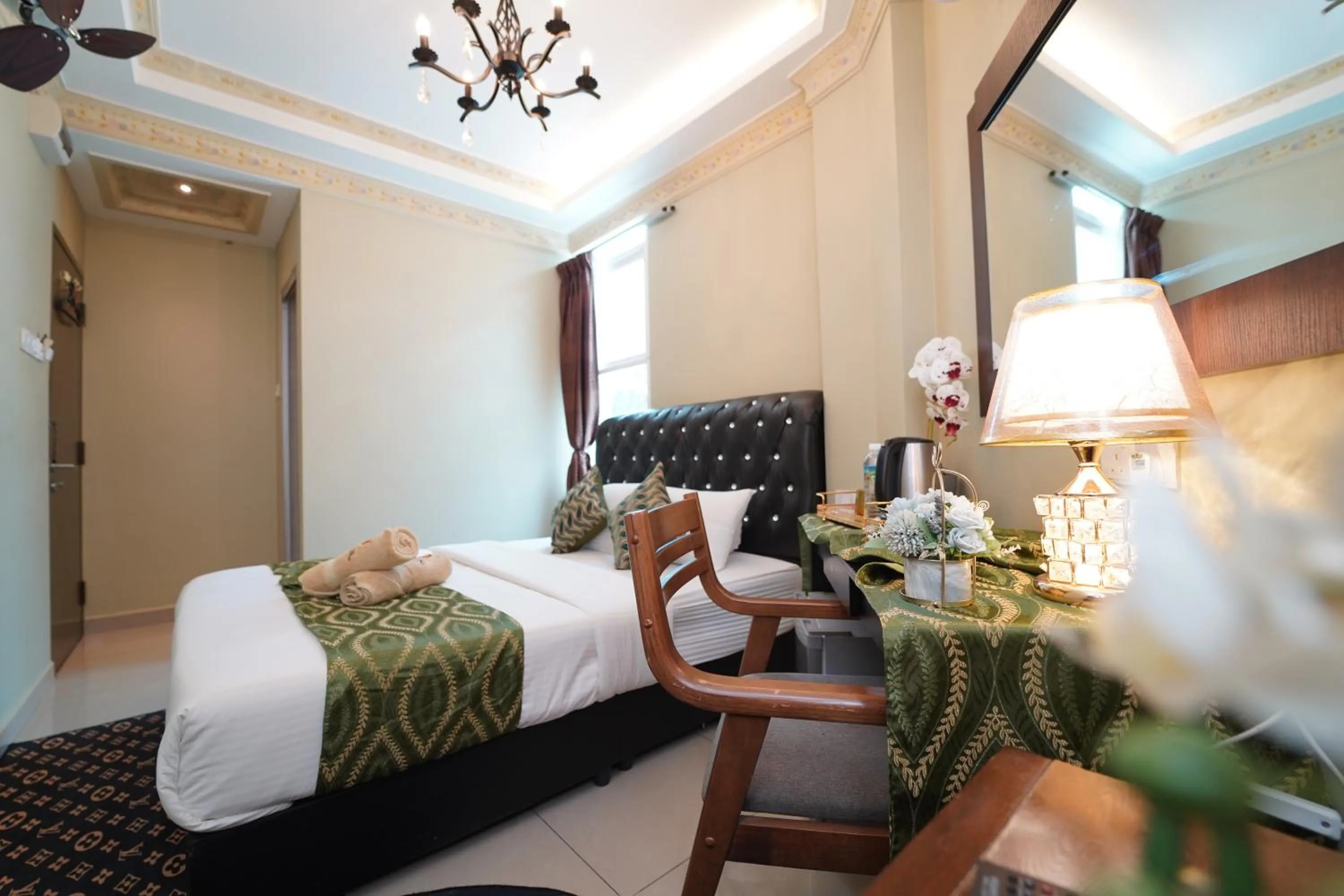 Bed in Ghazrin's Classic Hotel JB