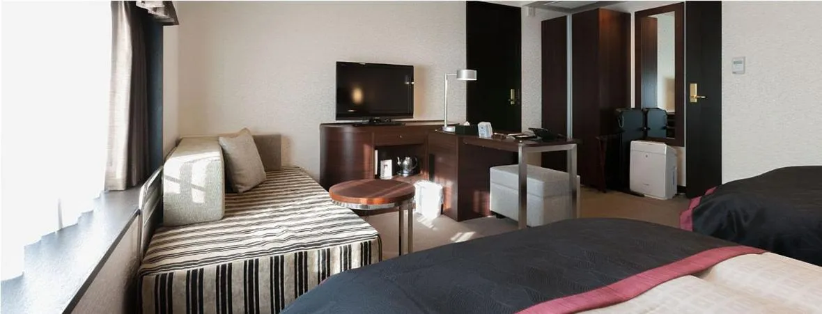 Bed in Onomichi Kokusai Hotel