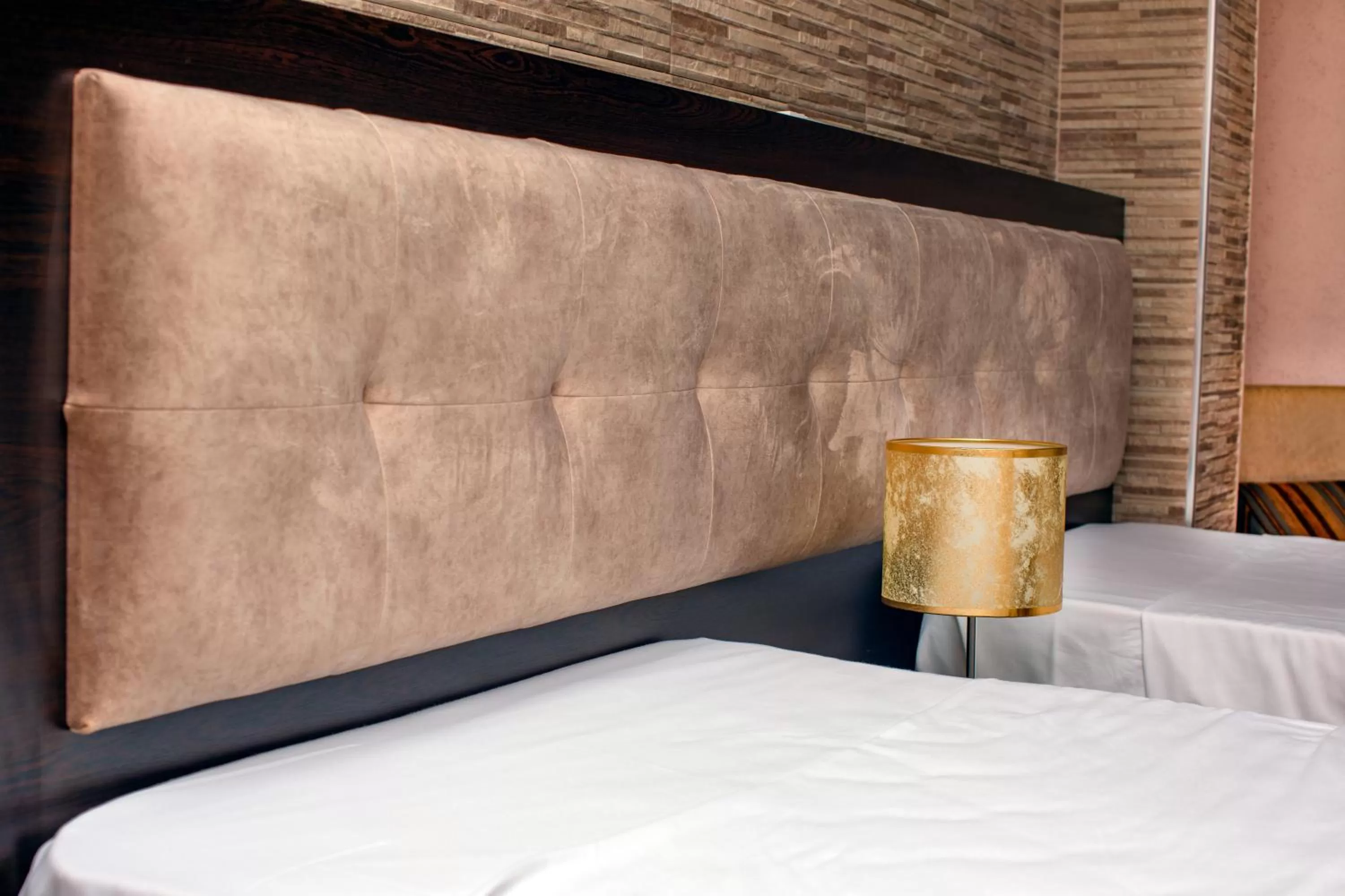 Bed in Fieri International Hotel