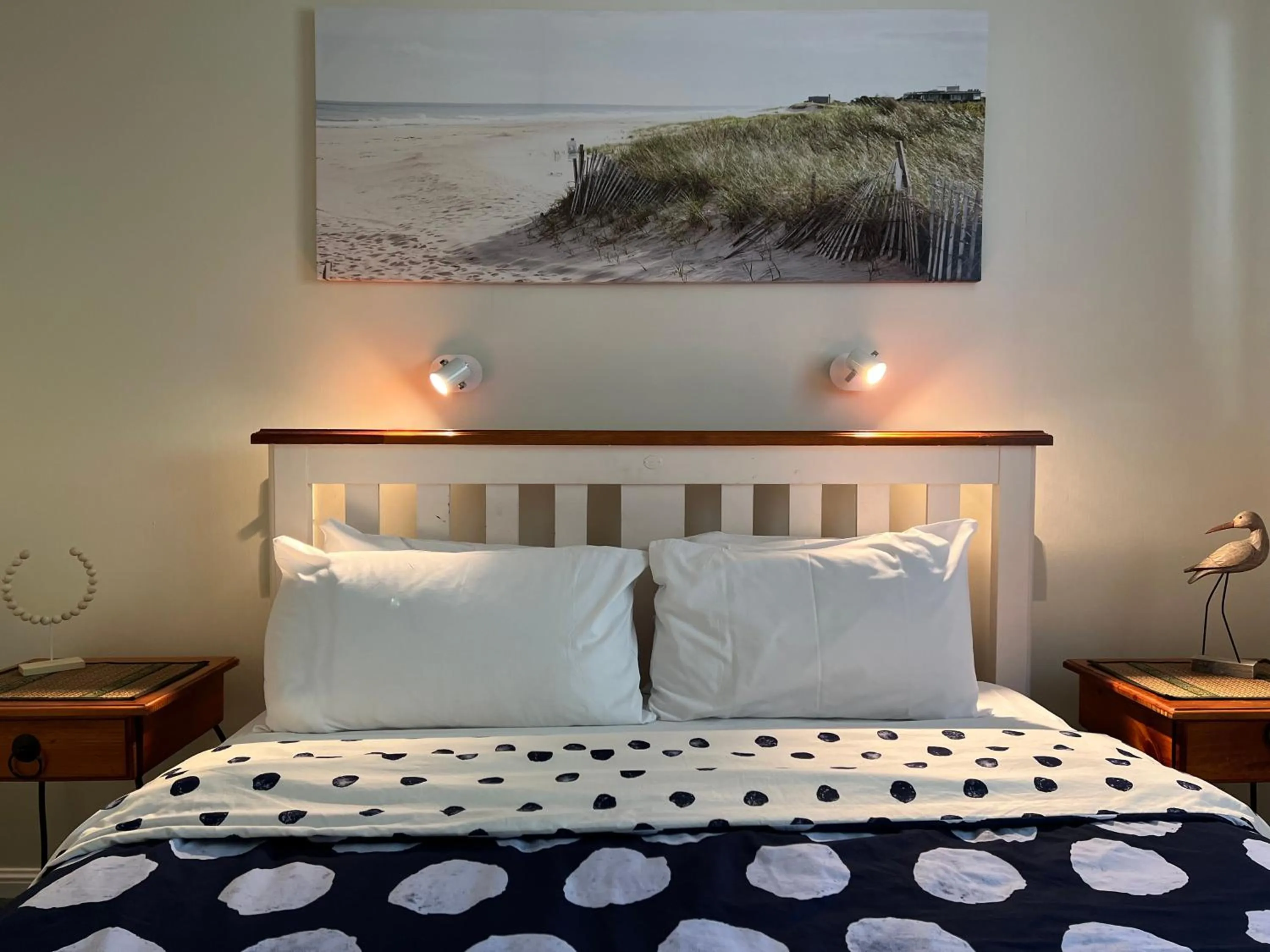 Bed in Colonial Village Resort