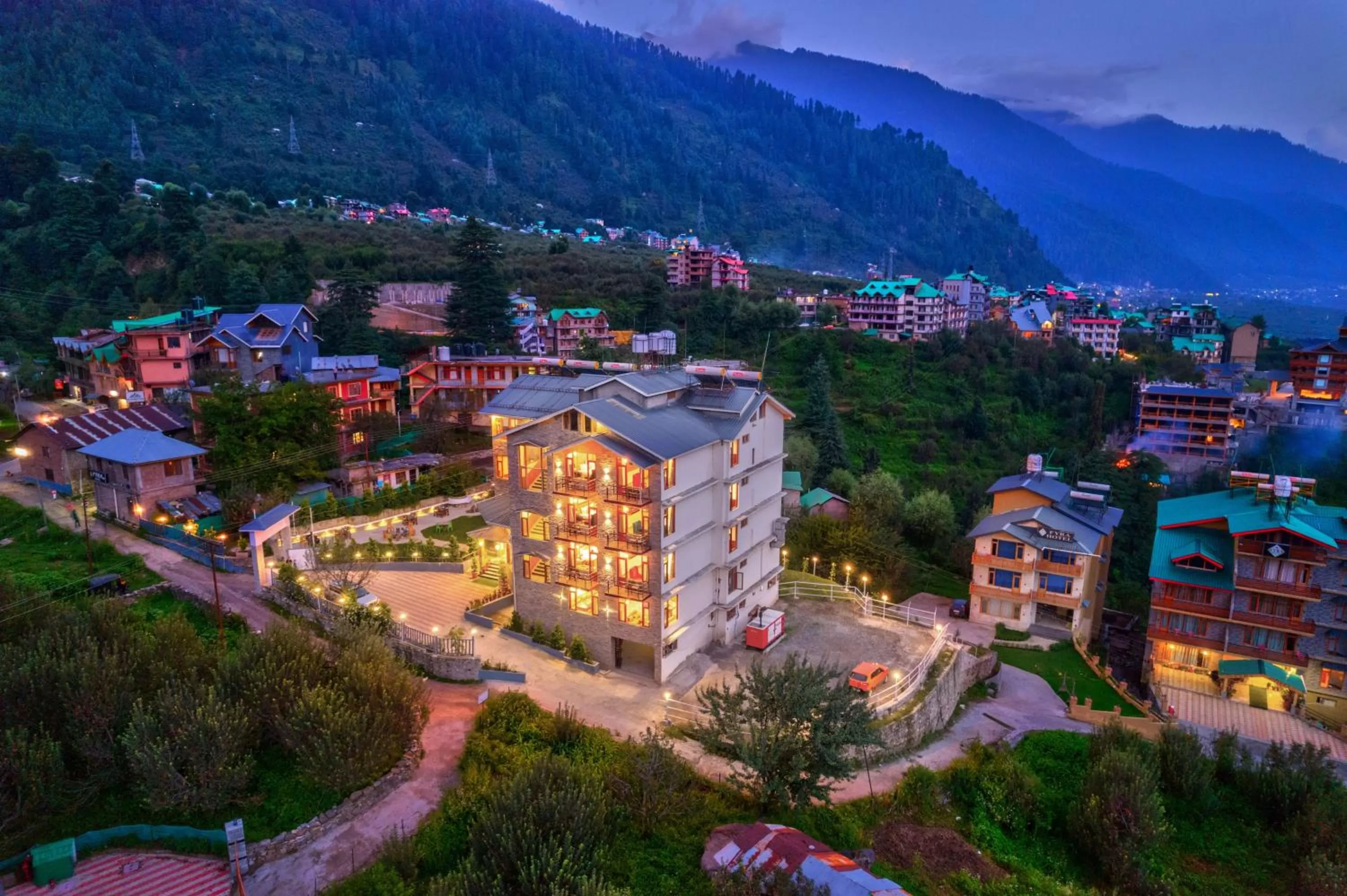 Property building in Snow City's Montana Blues Resort Manali - Heated & Air-Cooled Stay