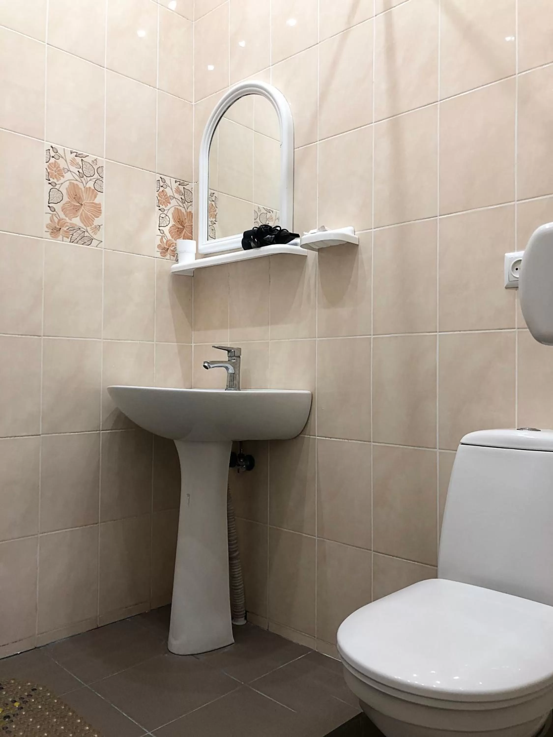 Bathroom in Zolotoy Bereg Hotel