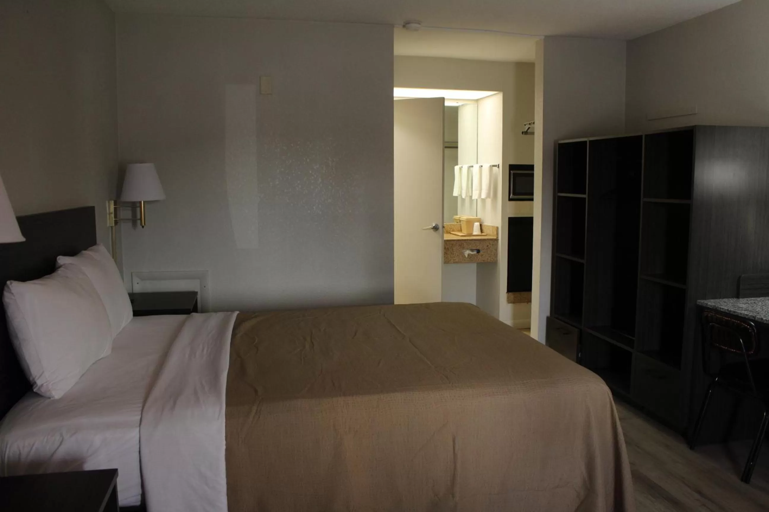 Bed in VIP Inn and Suites