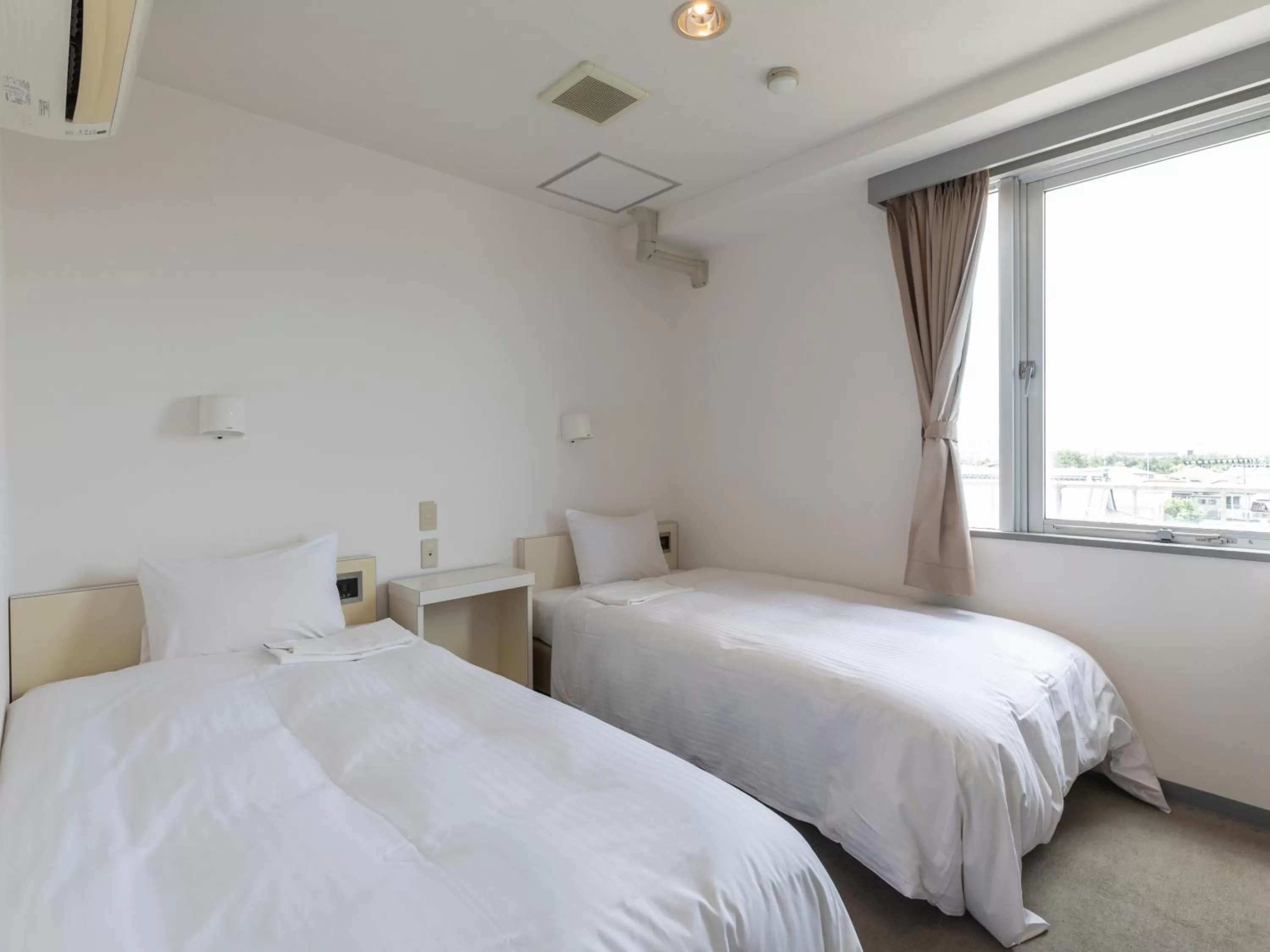 Photo of the whole room, Bed in Tabist Hotel Yuan Akashi