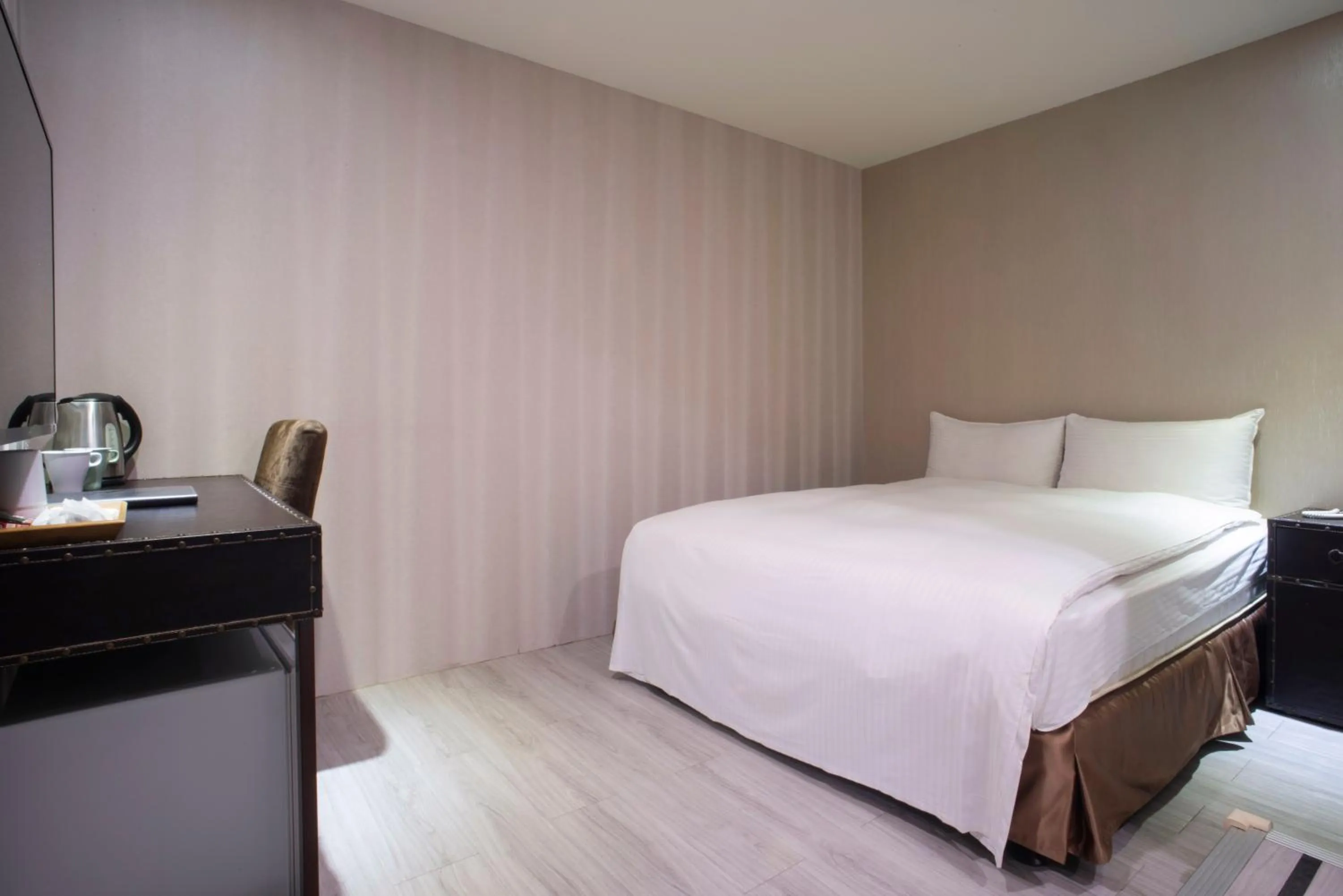 Photo of the whole room, Bed in XinsheHotel - Chungli