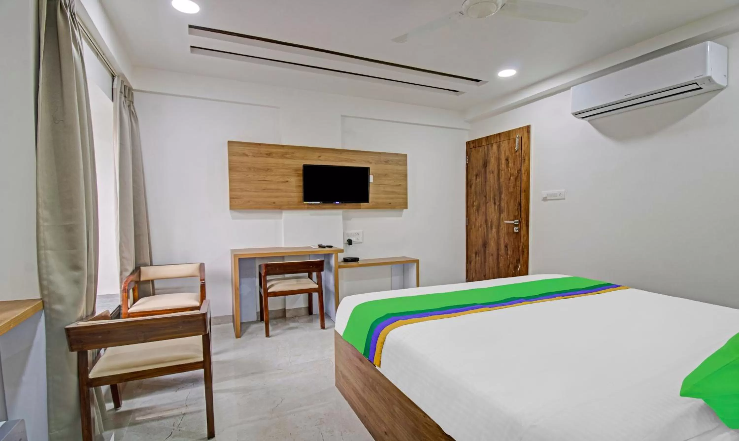 Bedroom, Bed in Treebo Chandraprasth Residency