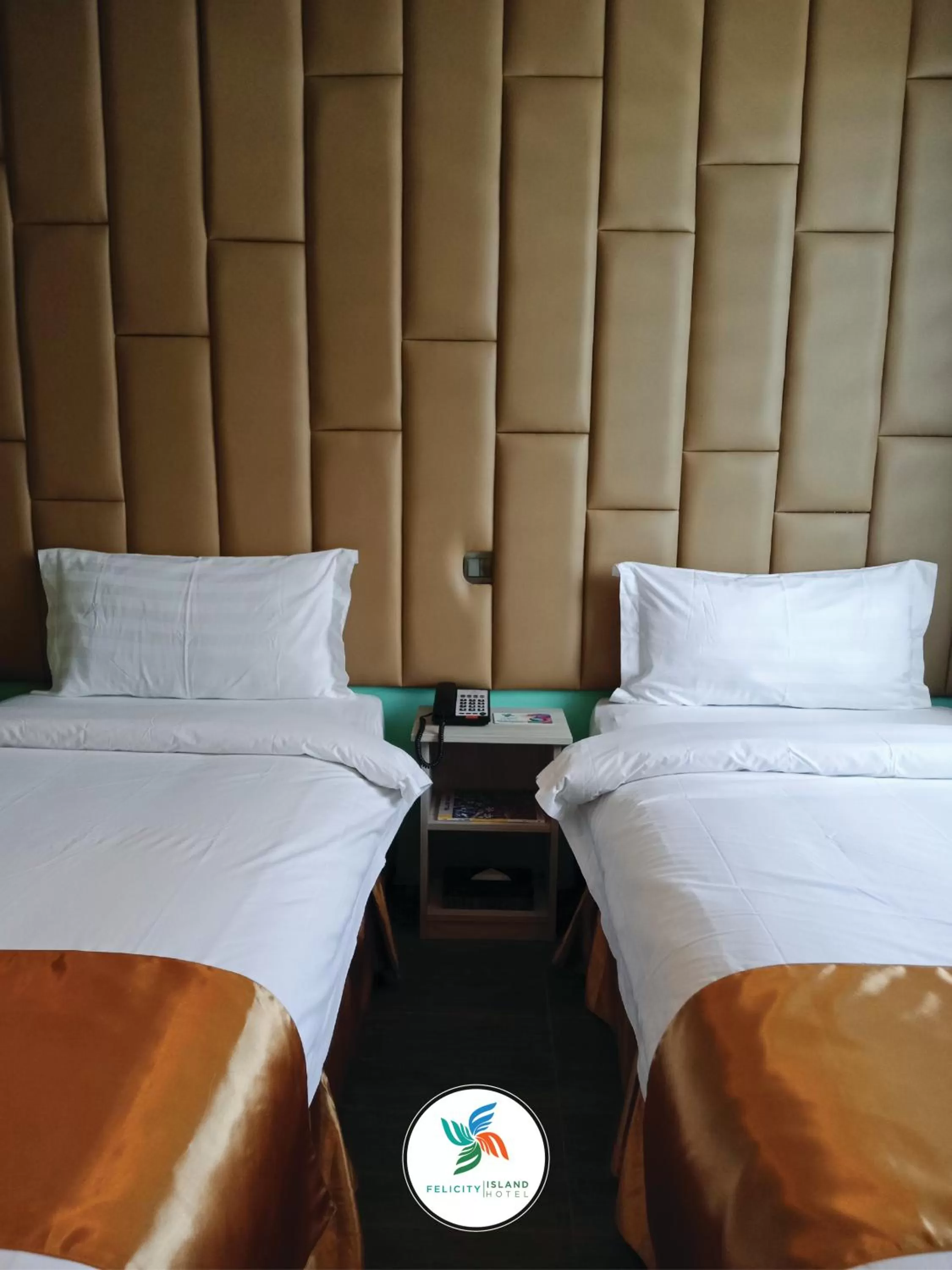 Bed in Felicity Island Hotel