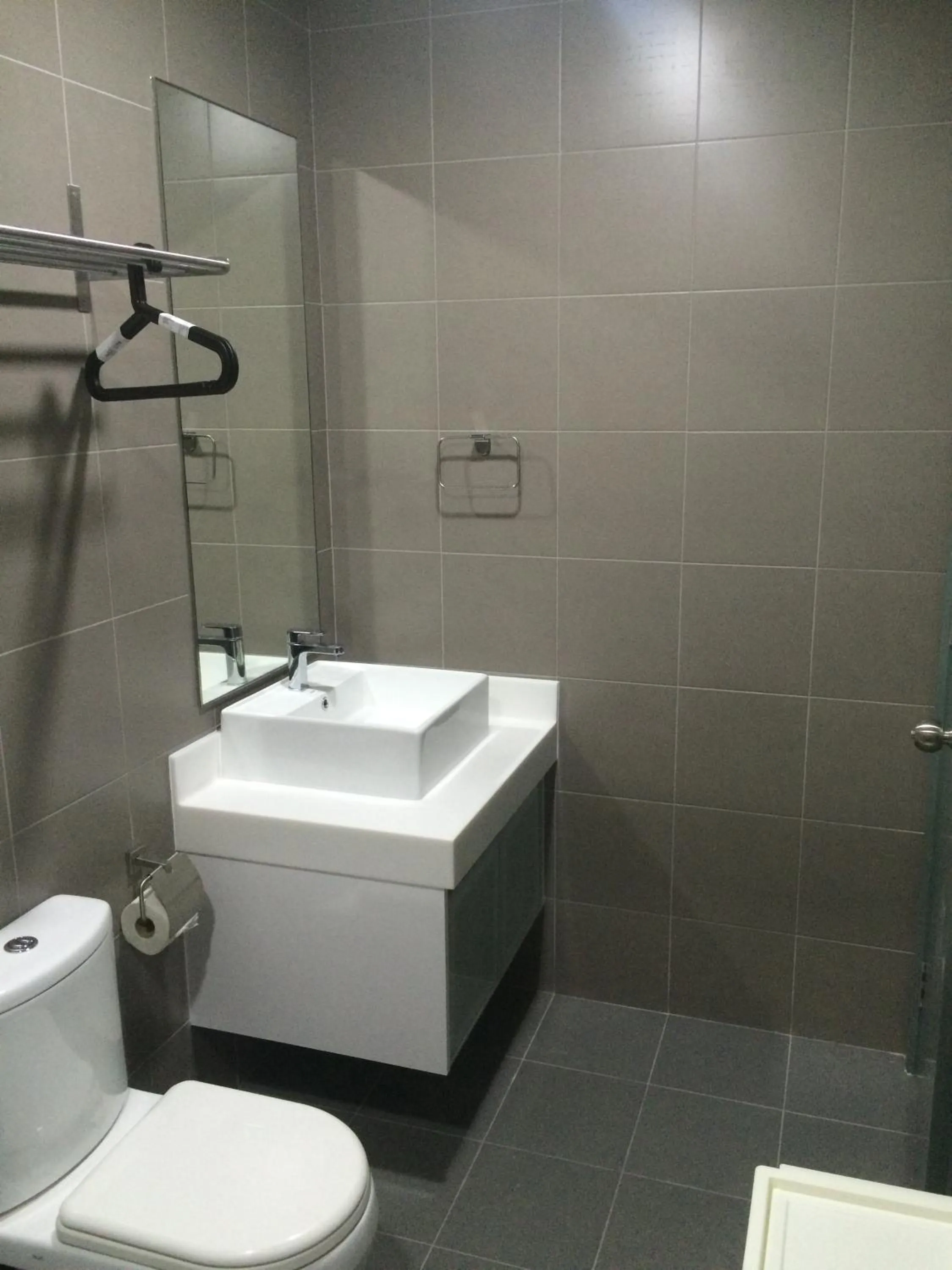 Bathroom in Summer Suites Residences by Subhome