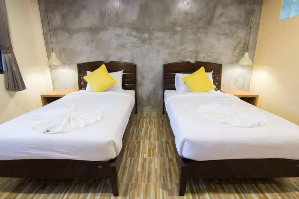 Bed in K.L. Boutique Hotel