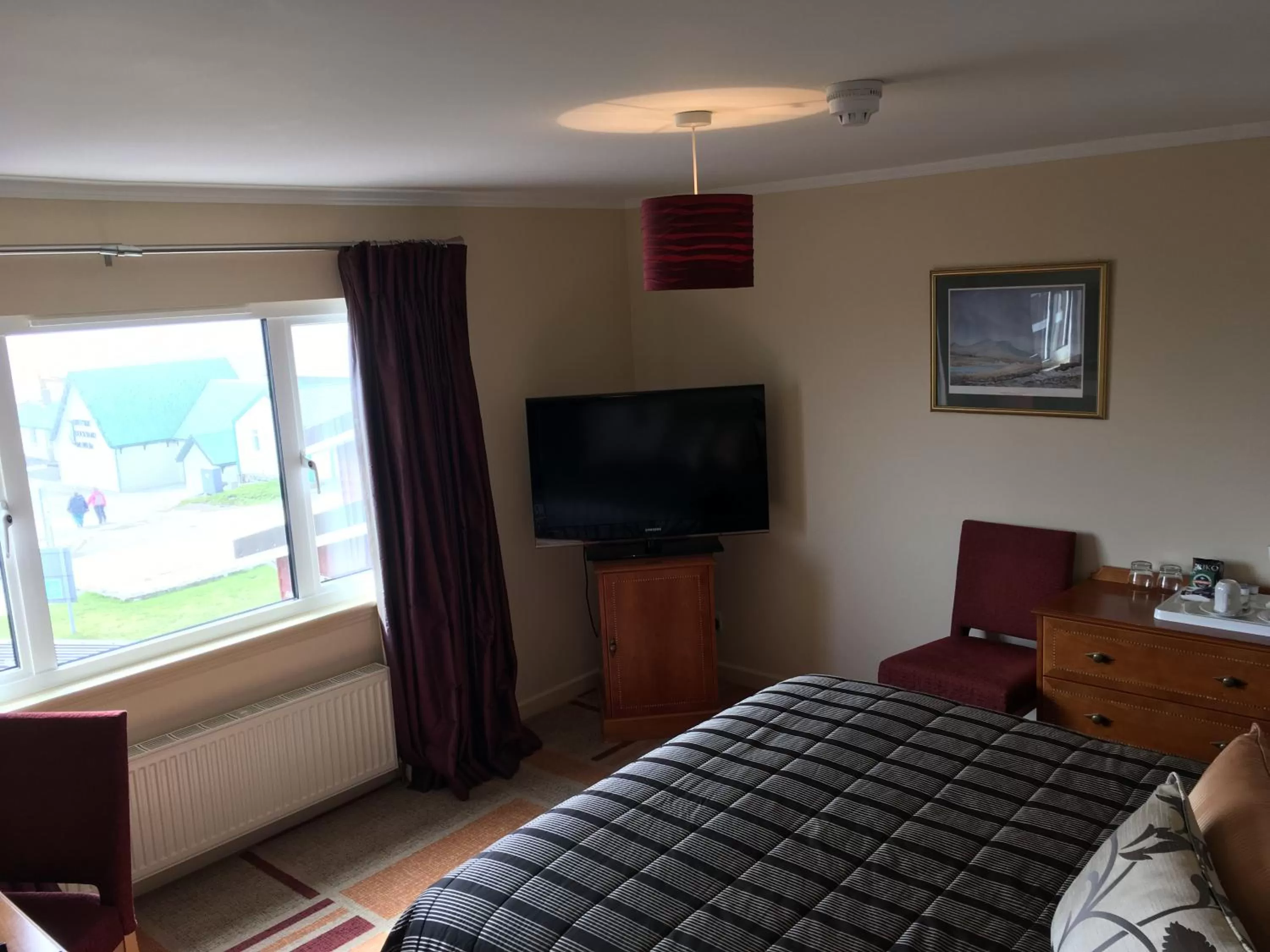 TV/Entertainment Center in Malvina House Hotel