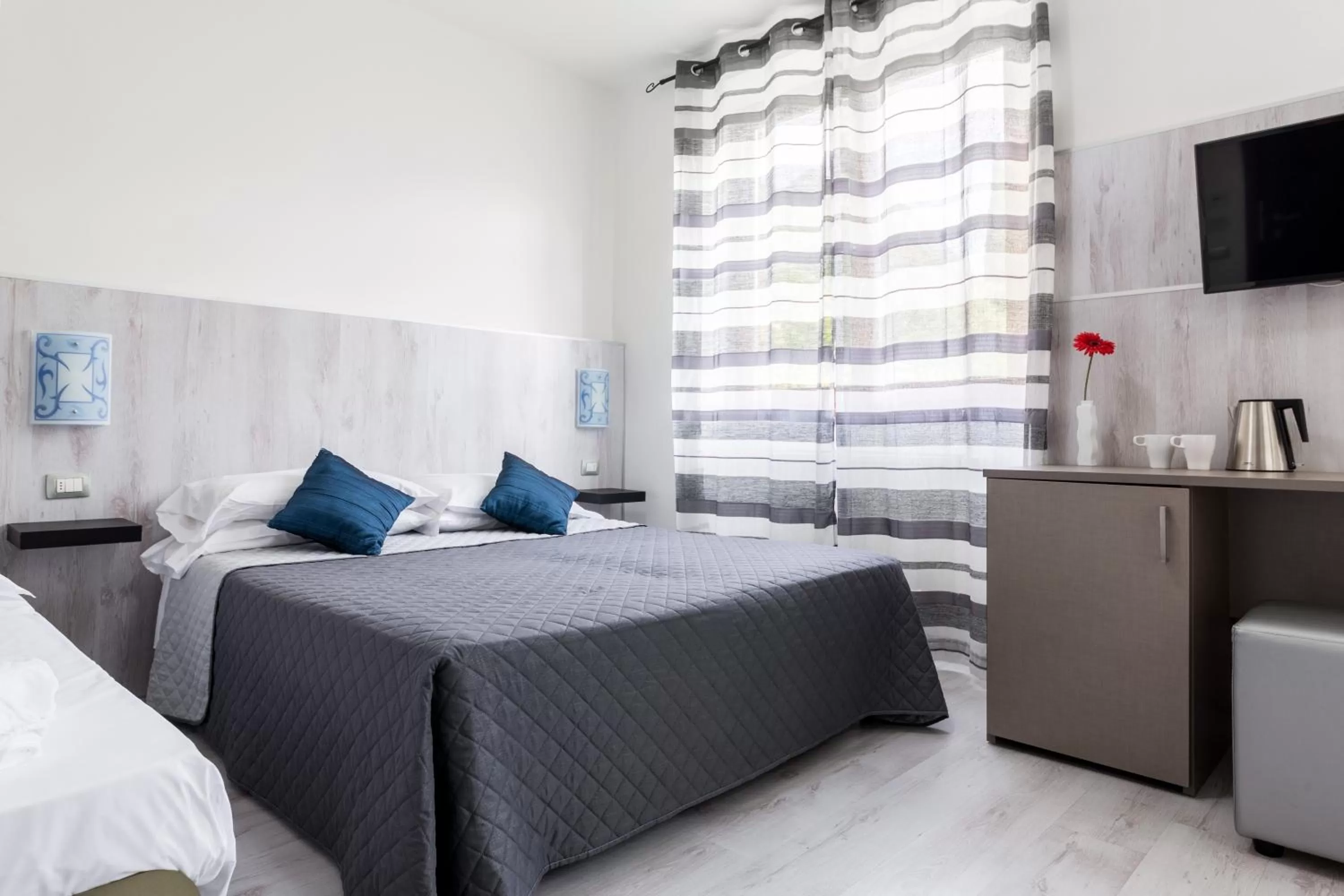 Bed in Hotel Canarino