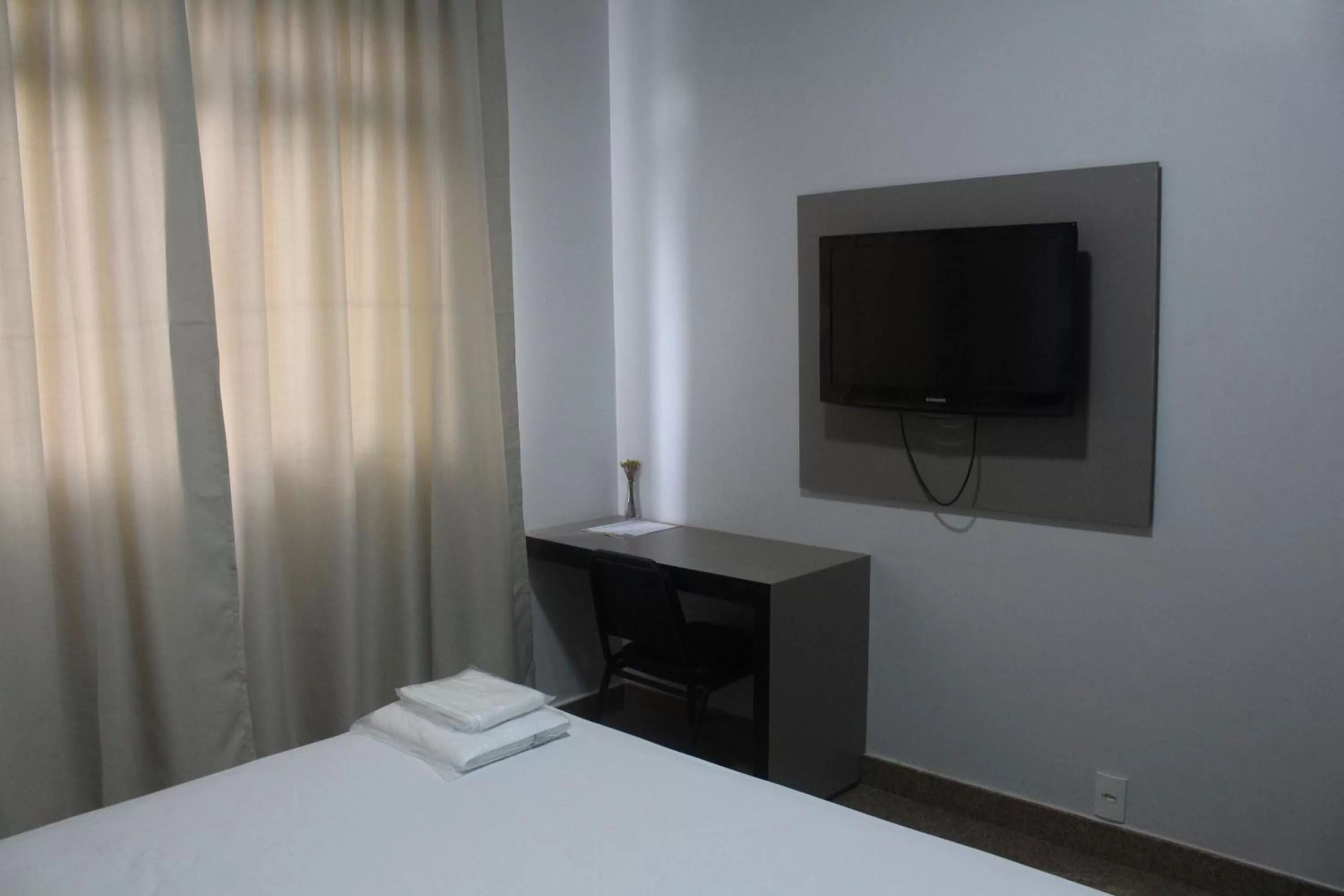 TV/Entertainment Center in Hotel Oscar Blue Montes Claros