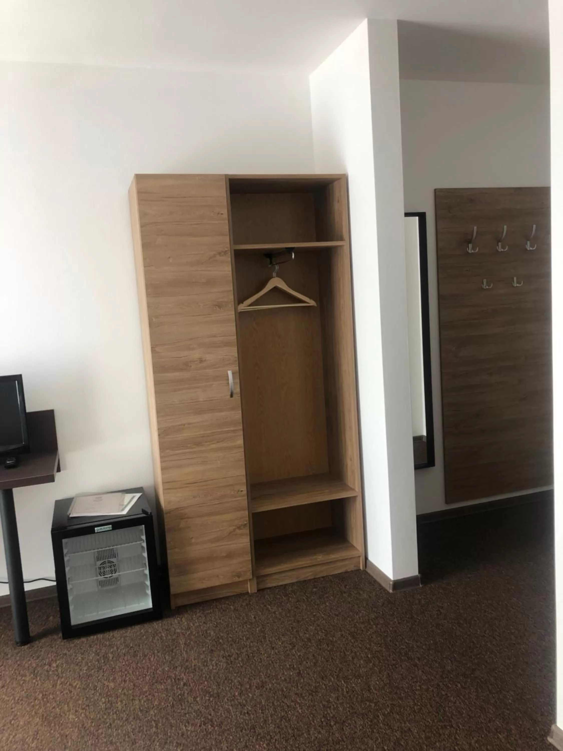 Communal lounge/ TV room, TV/Entertainment Center in Hotel Sport Mlada Boleslav