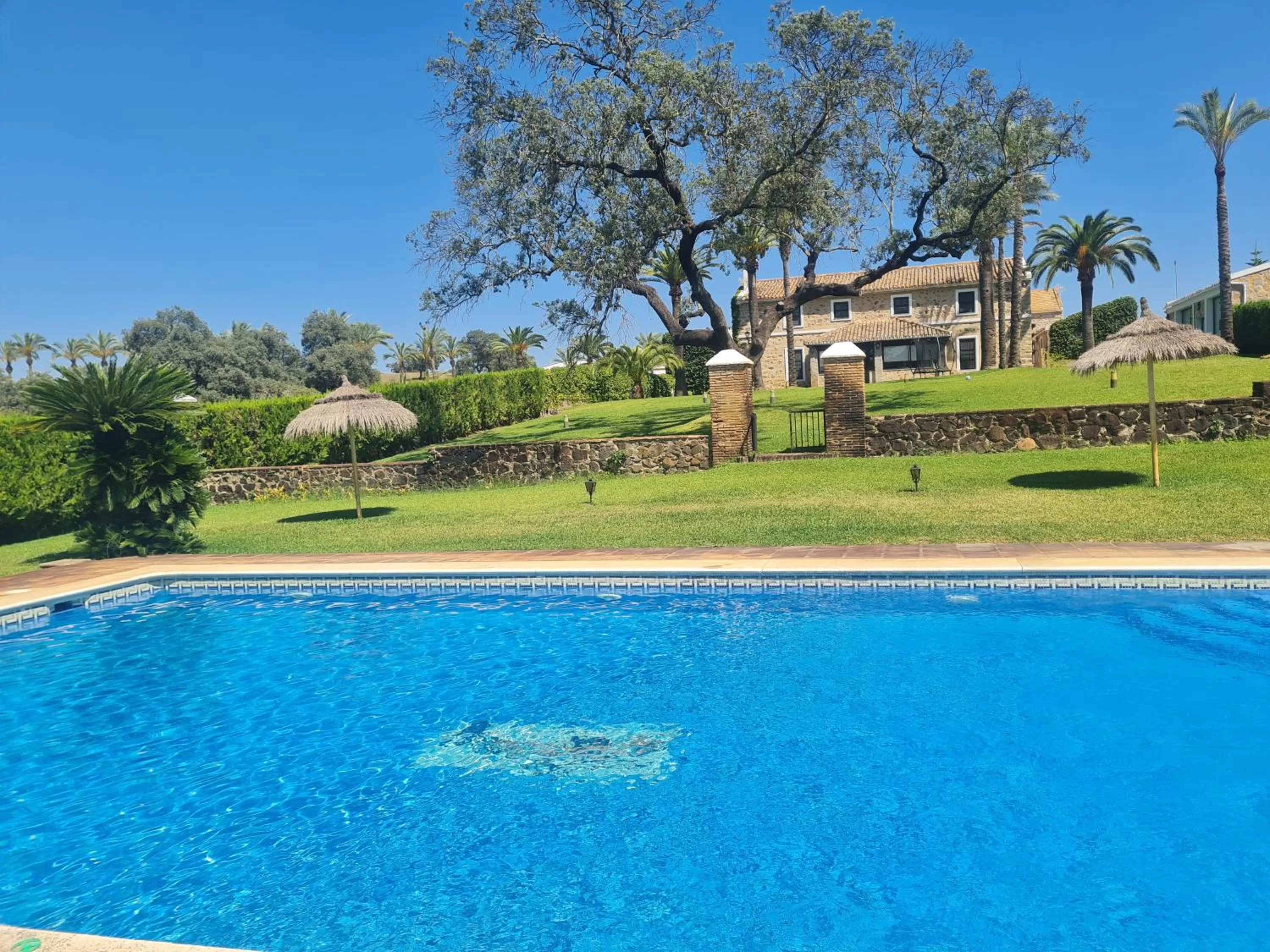 Property building, Swimming Pool in Alojamiento Rural Finca Barral