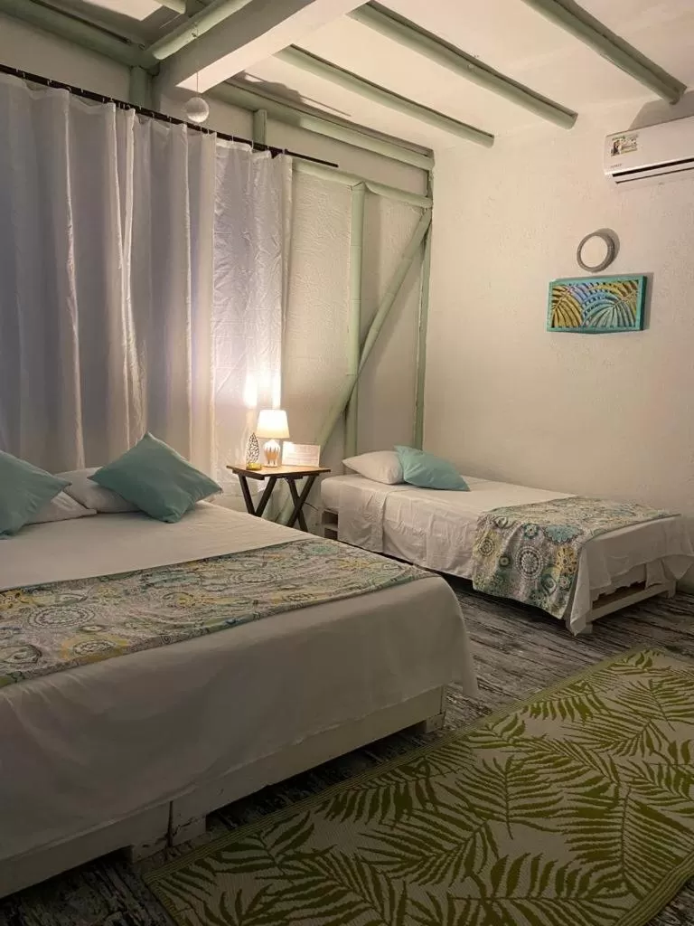 Bed in Massalli Sanctuary Lodge