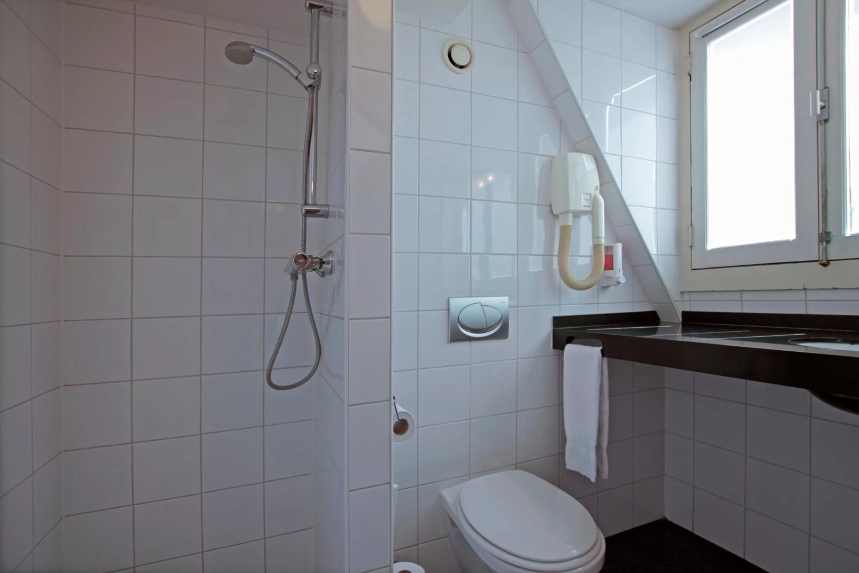 Bathroom in A-Train Hotel