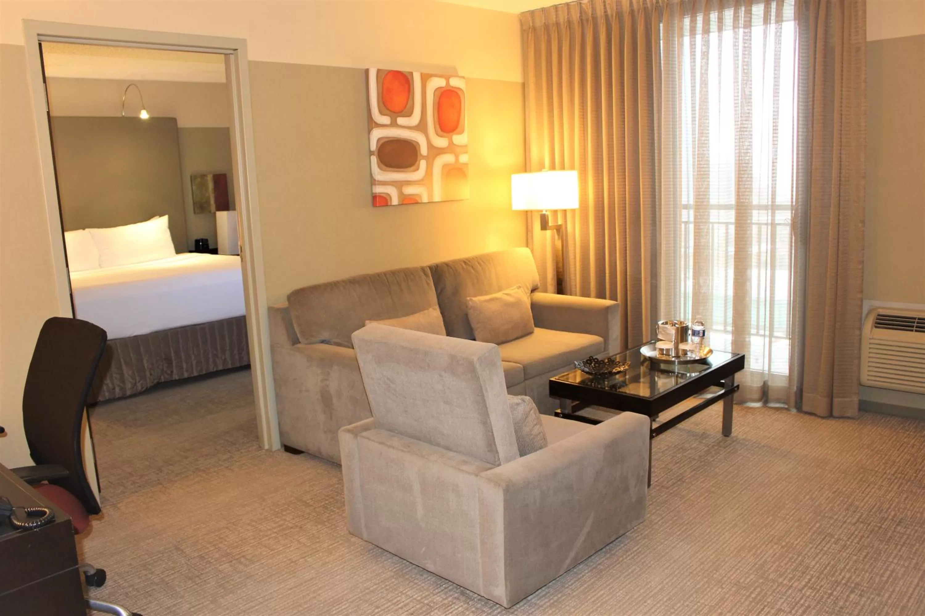 Living room, Bed in Crowne Plaza - Chicago West Loop by IHG