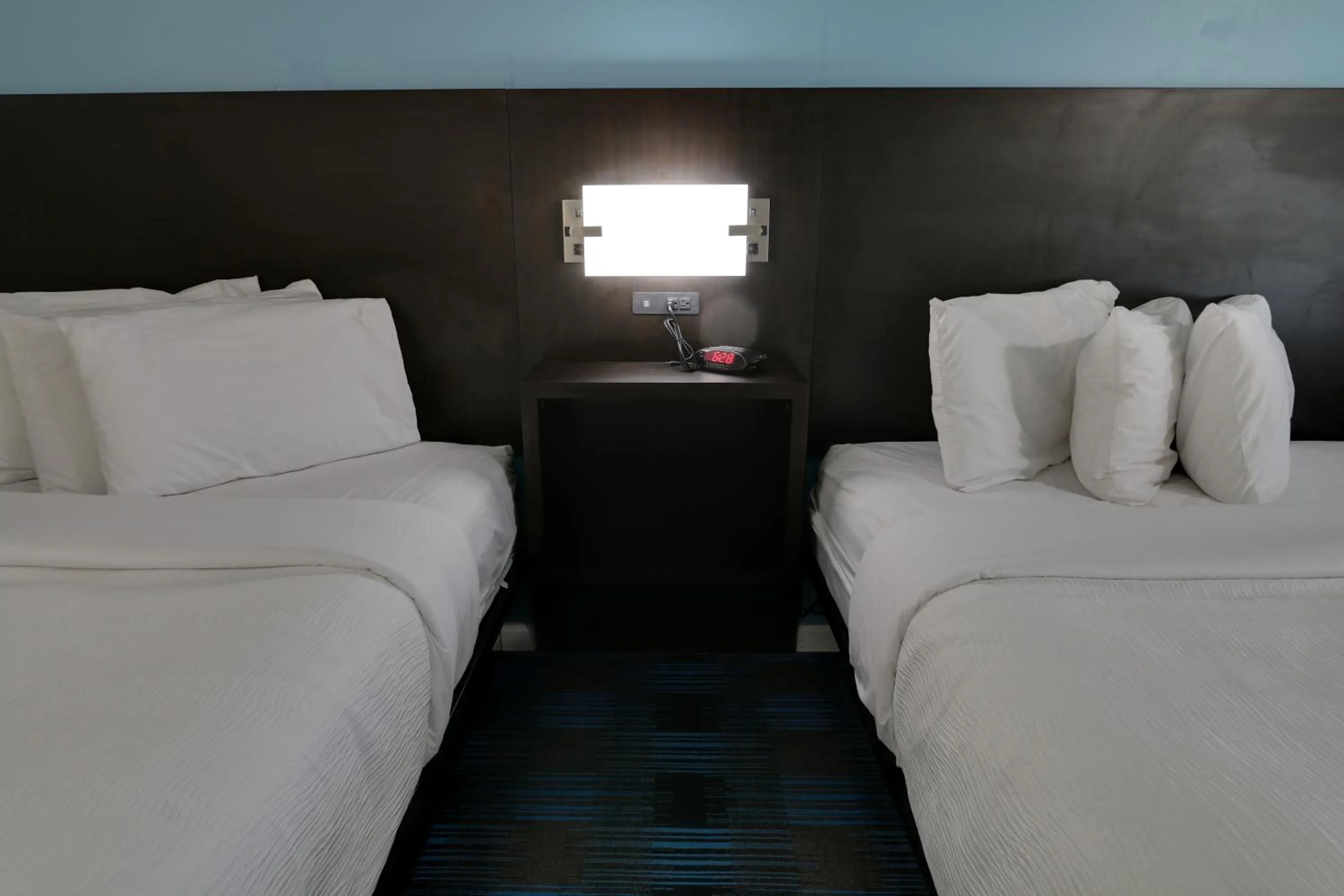 Bed in Travelodge by Wyndham Calhoun South I-75