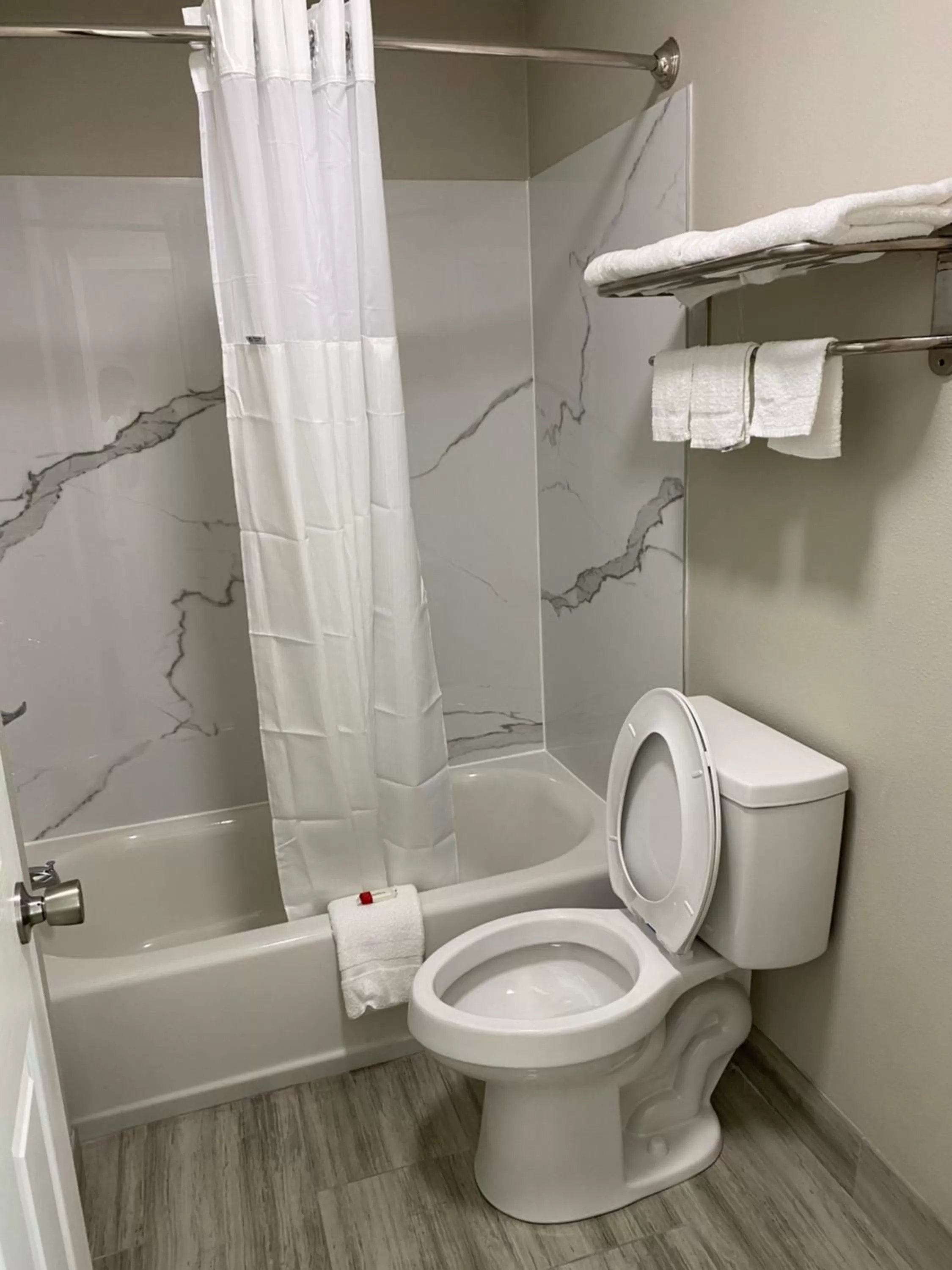 Toilet in Days Inn by Wyndham Lake Charles