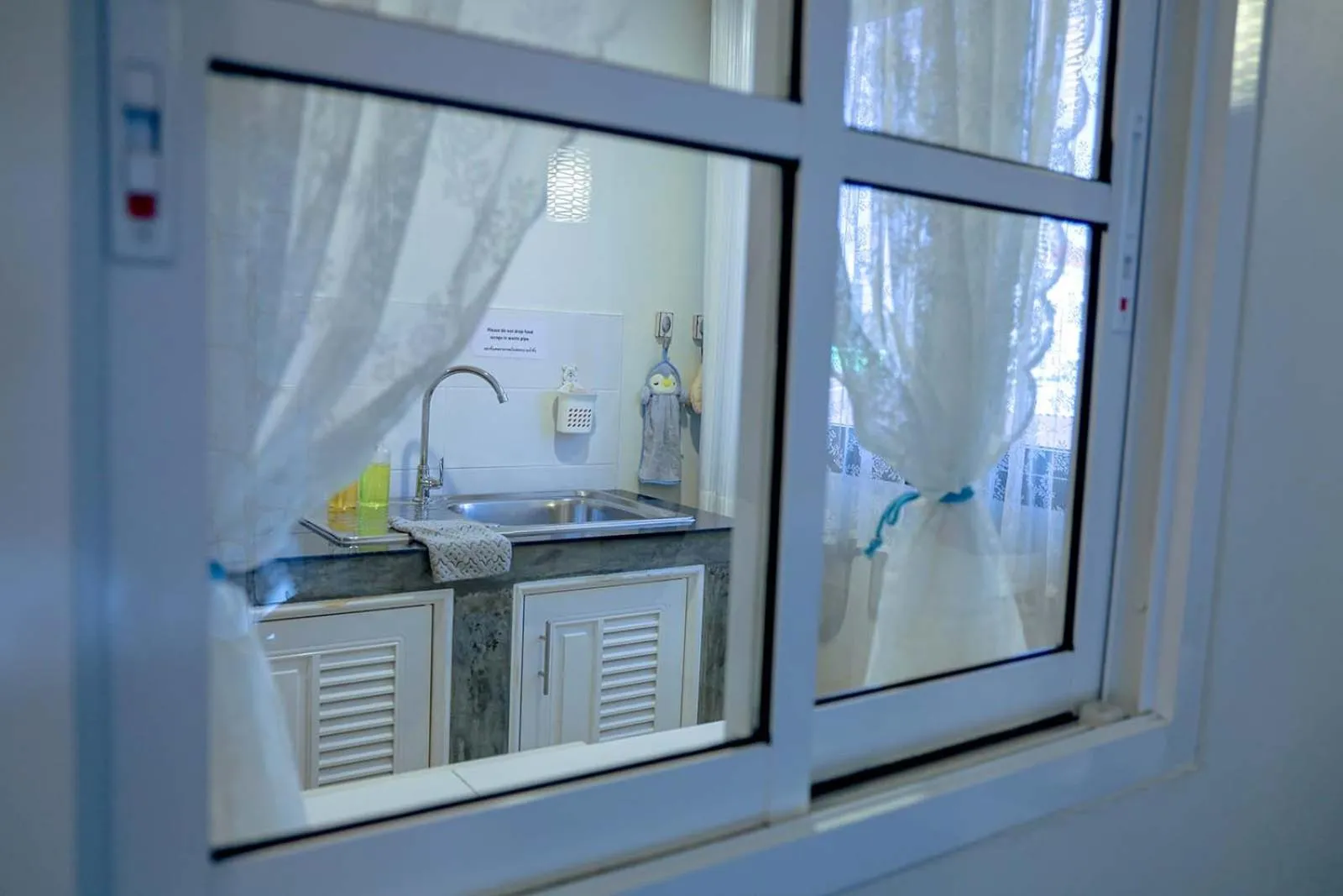 Kitchen or kitchenette in Jamjuree Home at Udonthani