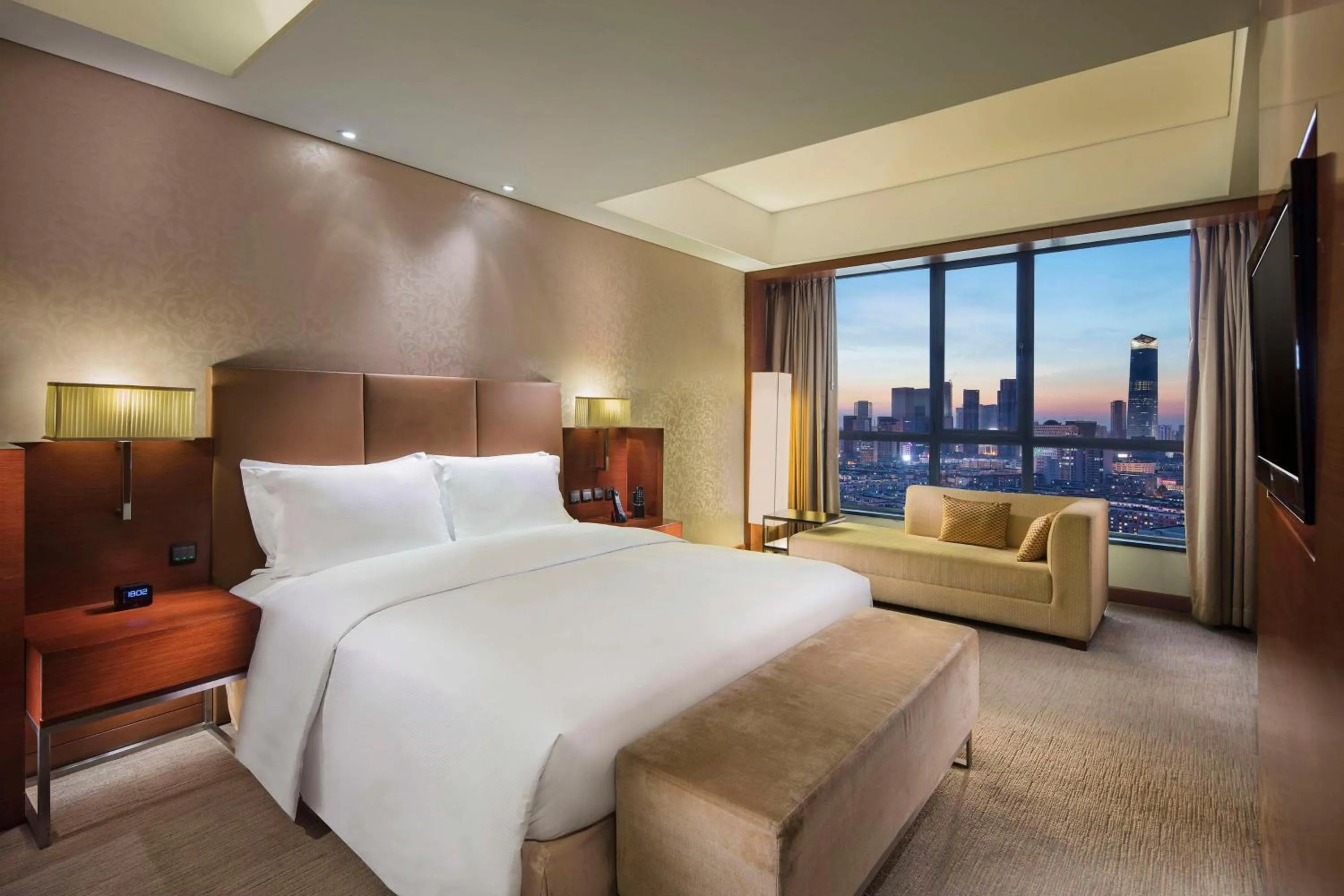 Living room, Bed in DoubleTree by Hilton Shenyang