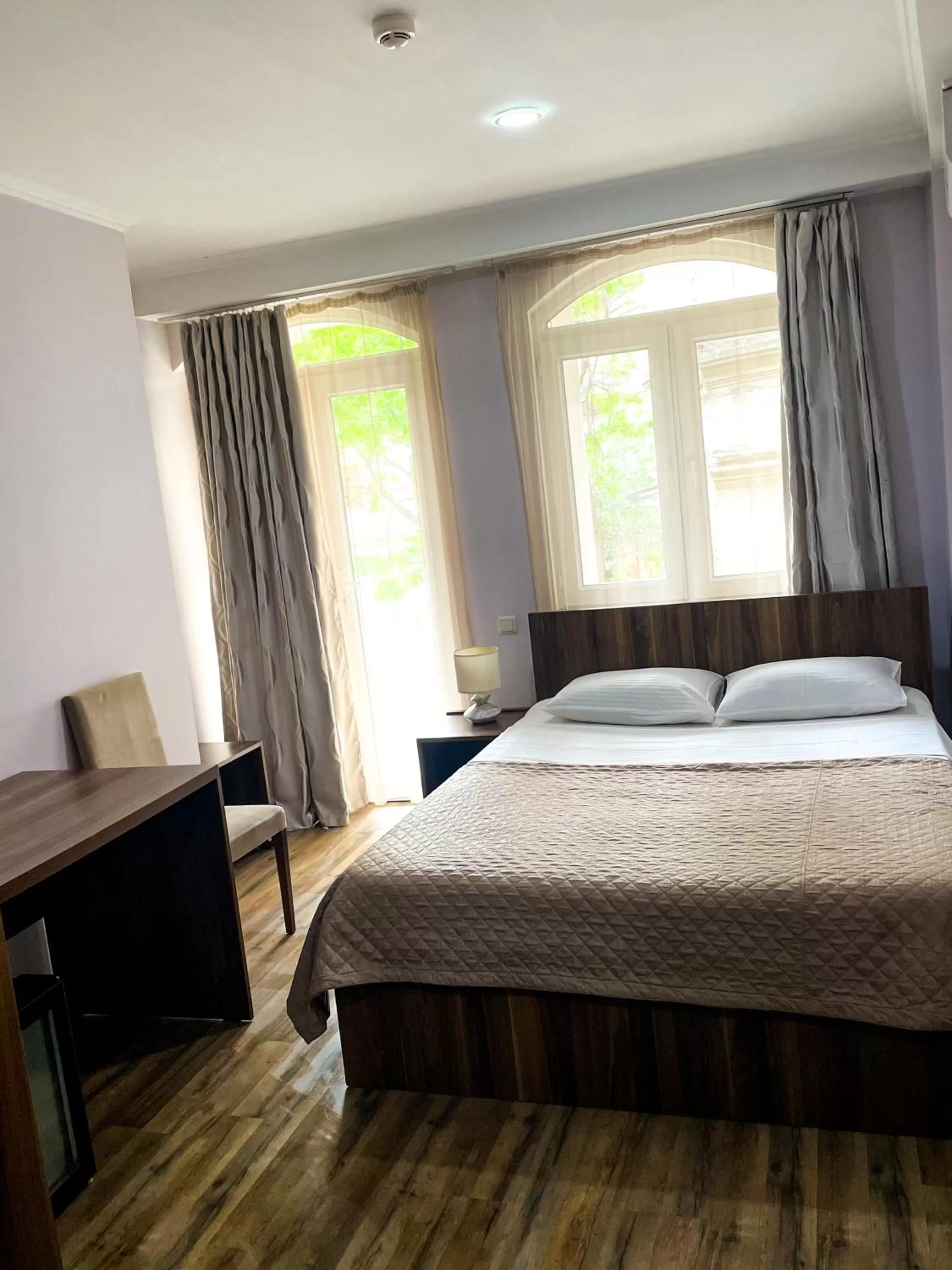 Bed in Hotel Dcorner