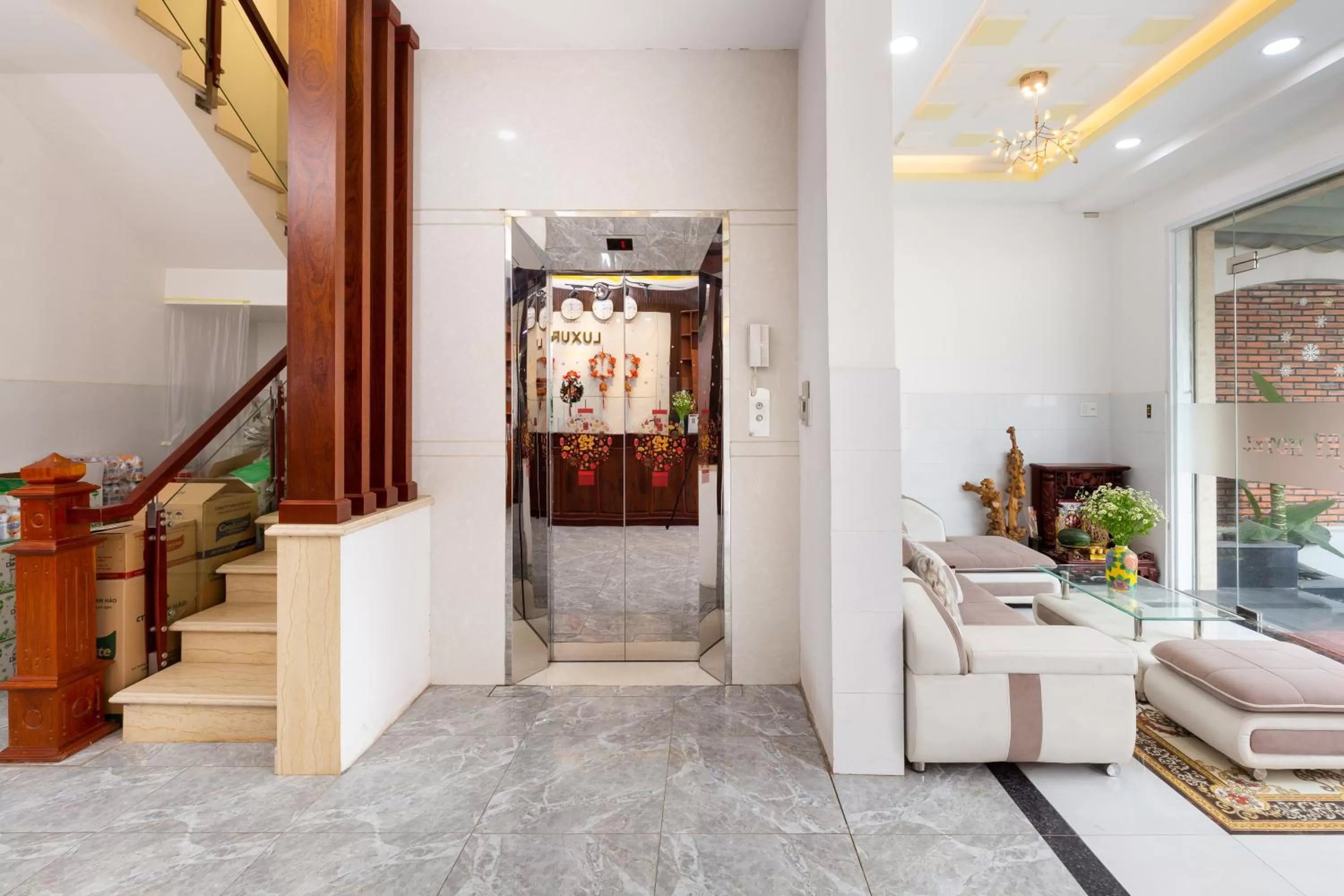 elevator, Lobby/Reception in Luxury Vườn Lài Hotel