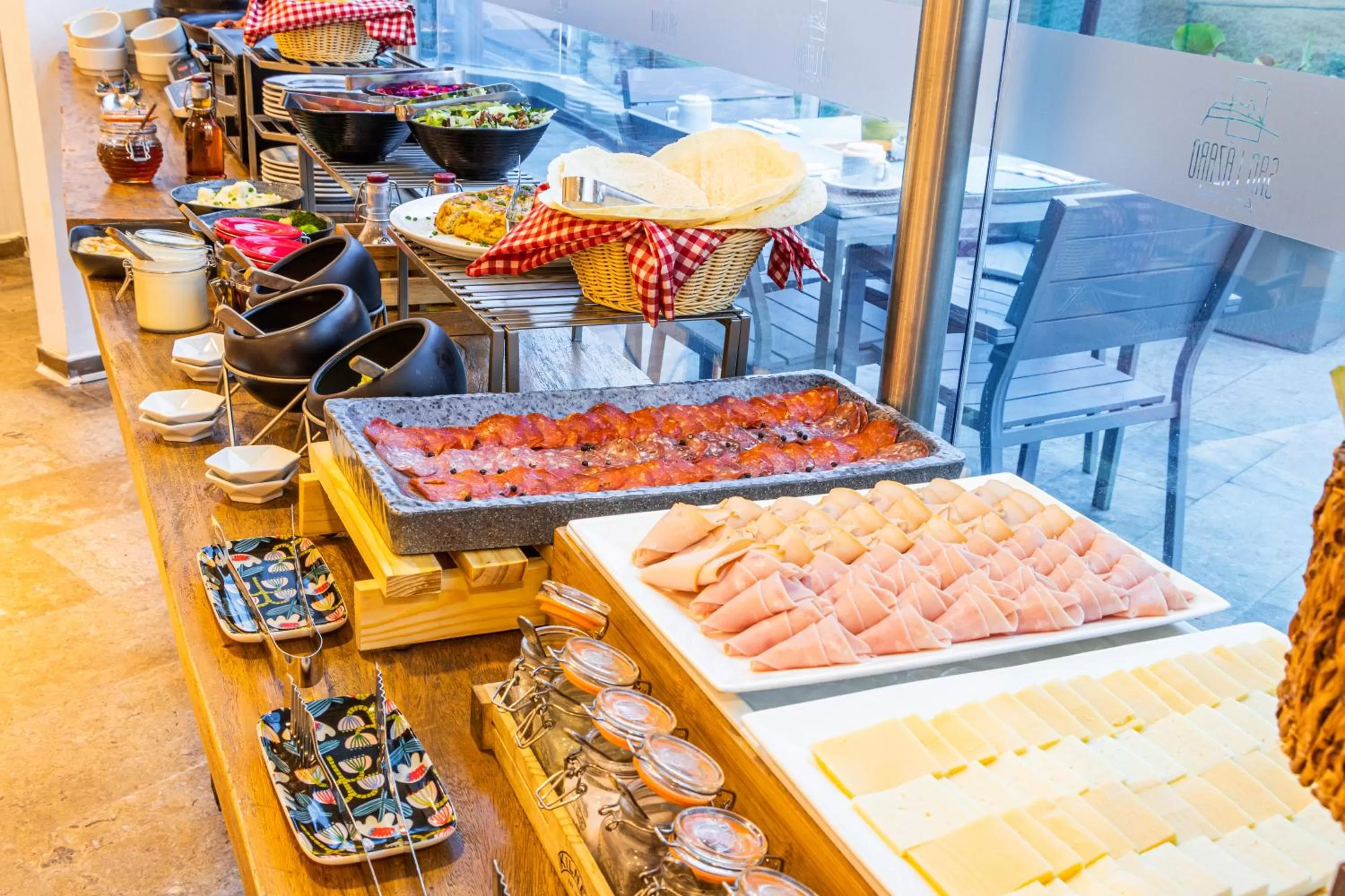 Buffet breakfast in GHL San Lazaro Art Hotel