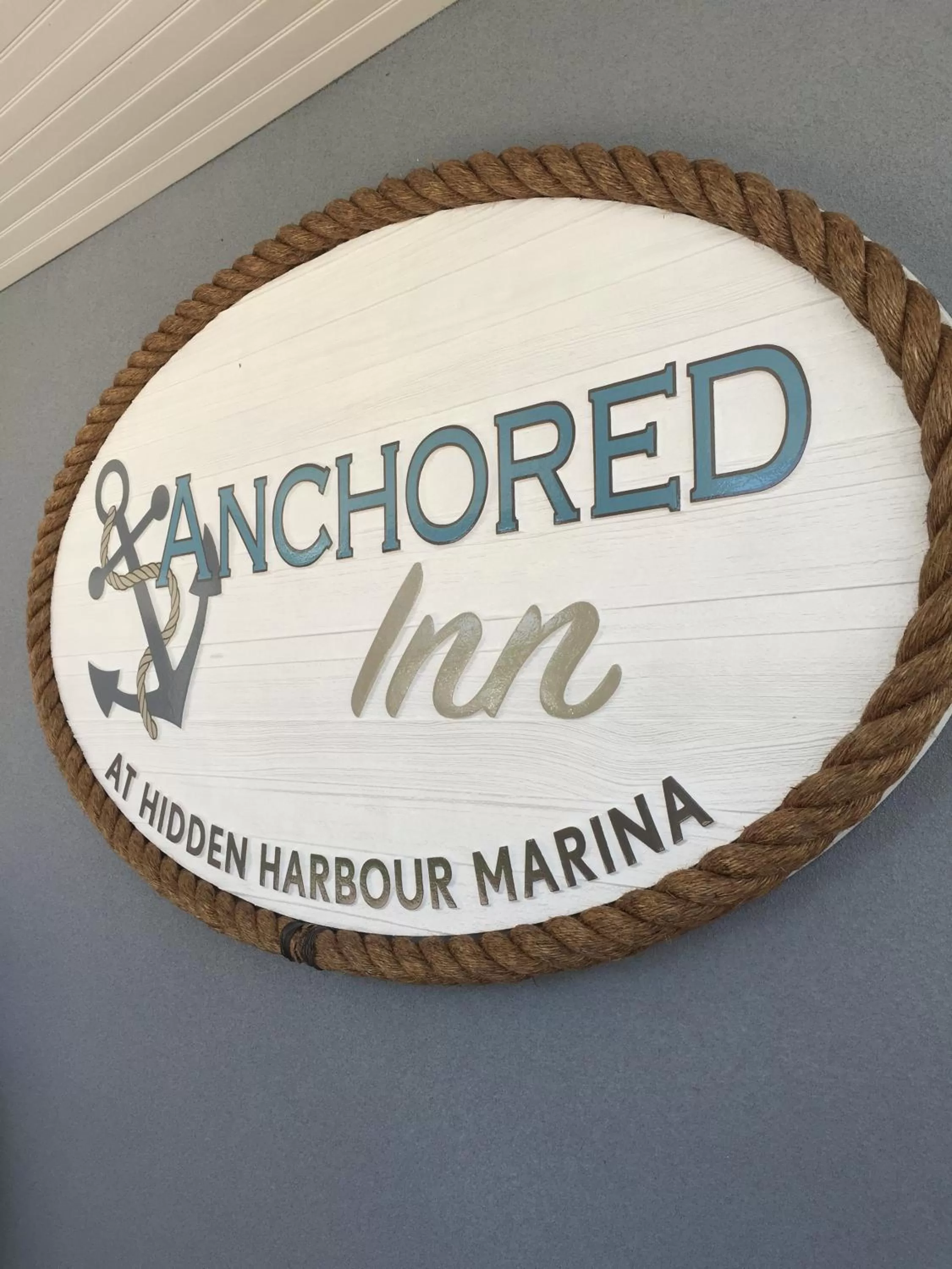 Property logo or sign in Anchored Inn at Hidden Harbor