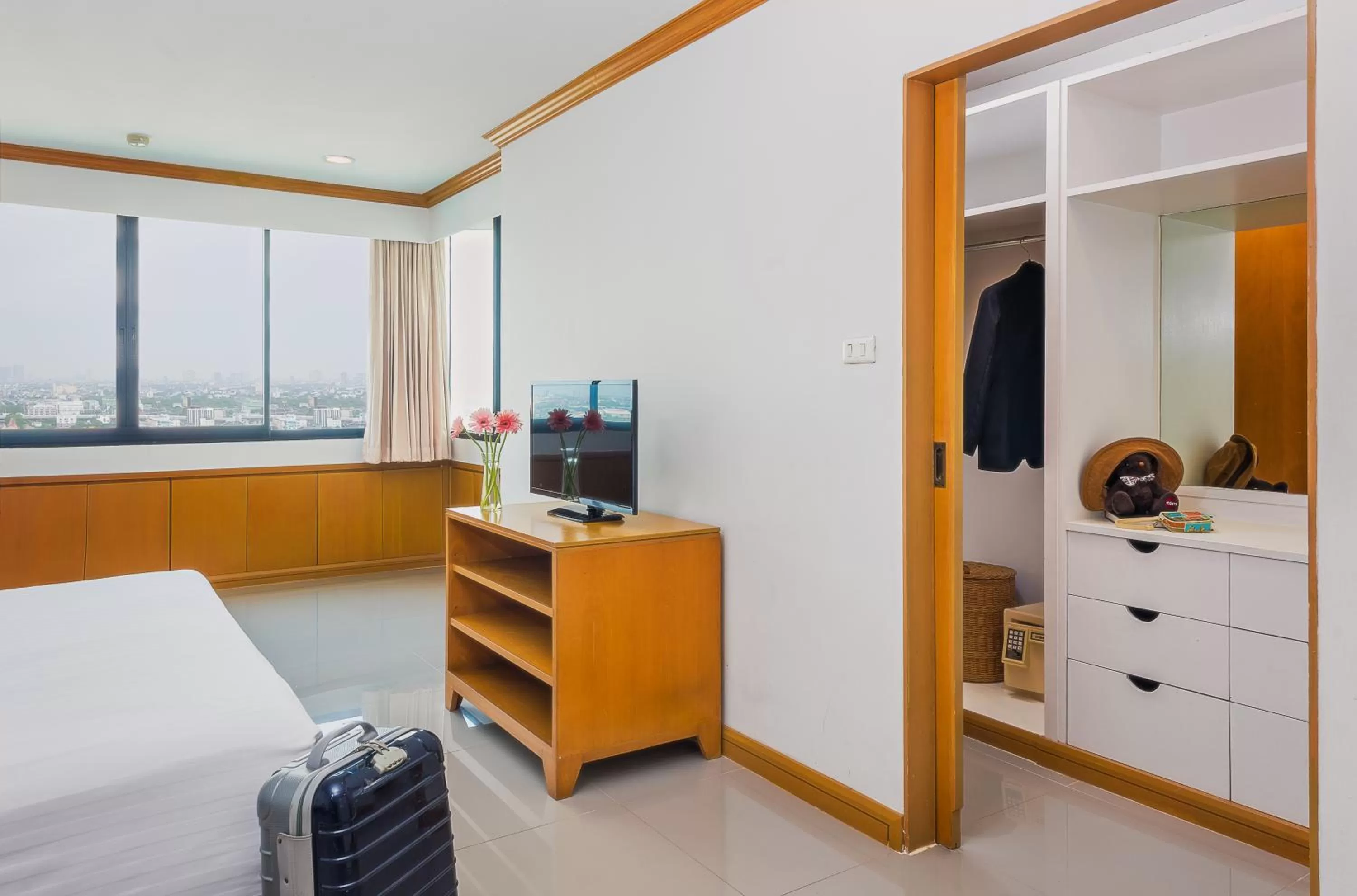 Bed in Riverine Place Hotel and Residence