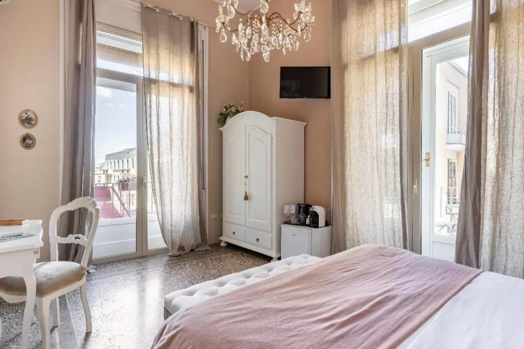 Bed in Joy's Bnb Ortigia