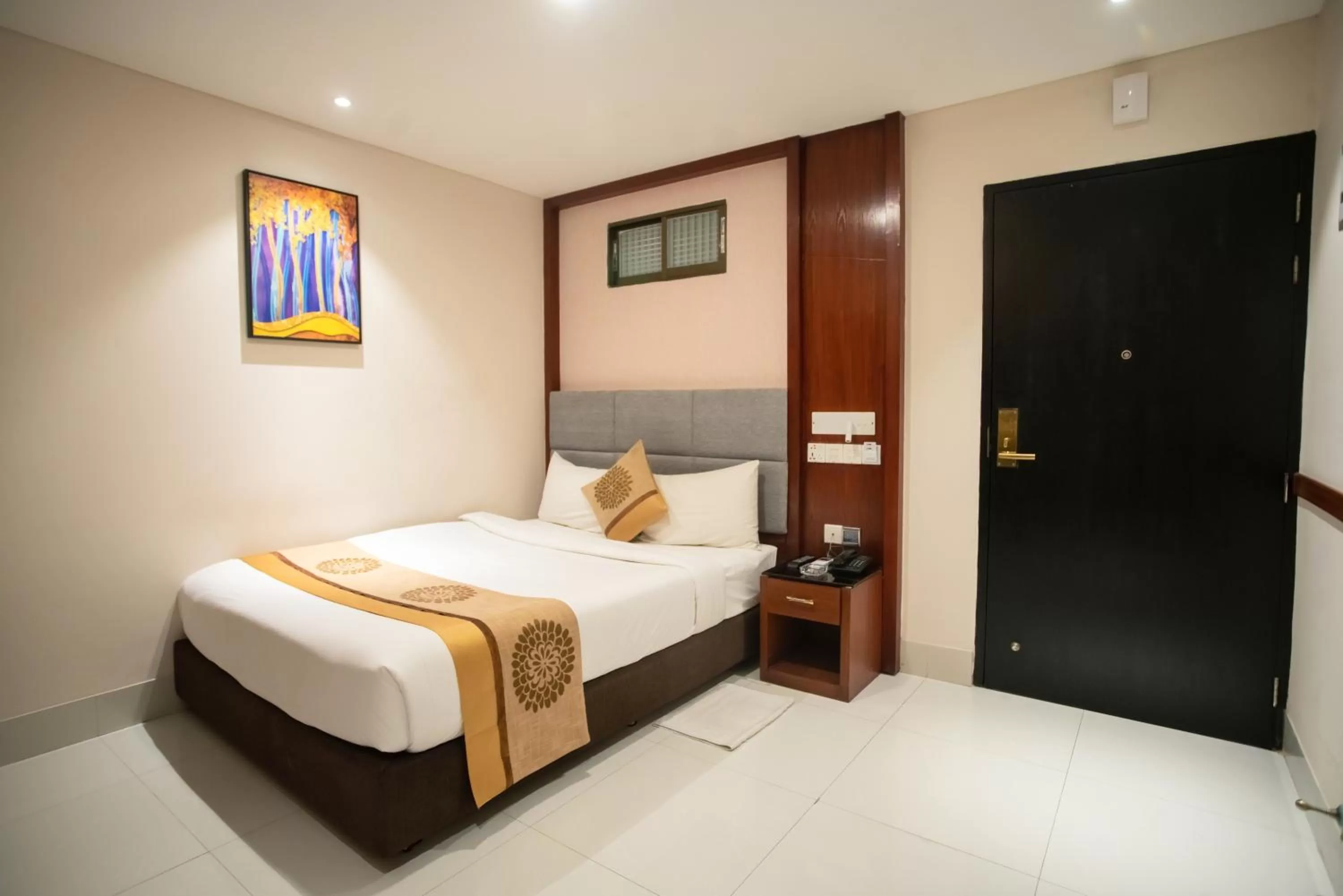 Bed in Jatra Hotel Grand Royal