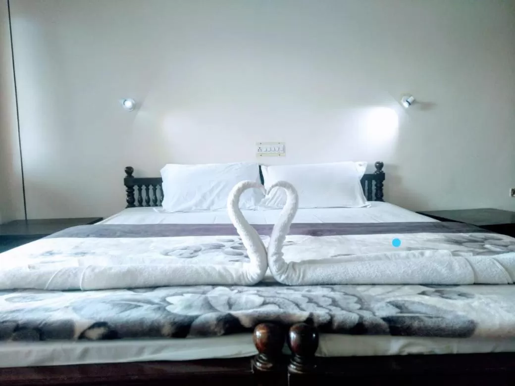 Bed in Vijaya Varma Beach Resort