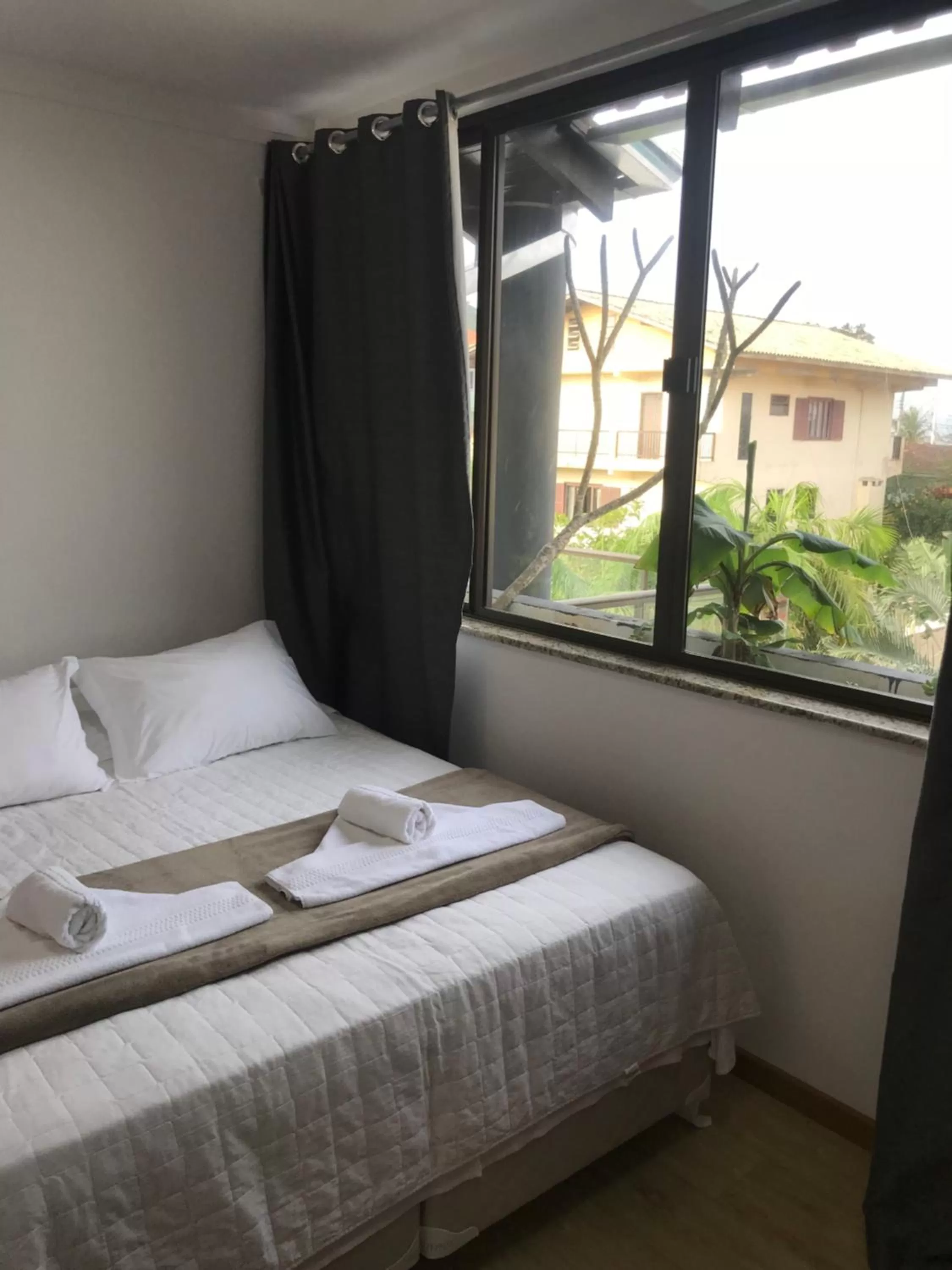 Bed in Pousada Casa da Praia