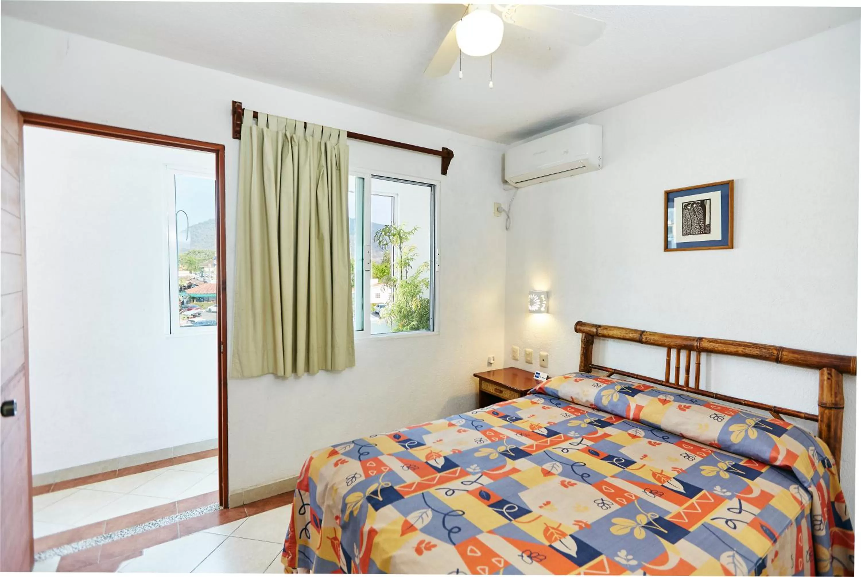 Photo of the whole room, Bed in Hotel Suites Ixtapa Plaza