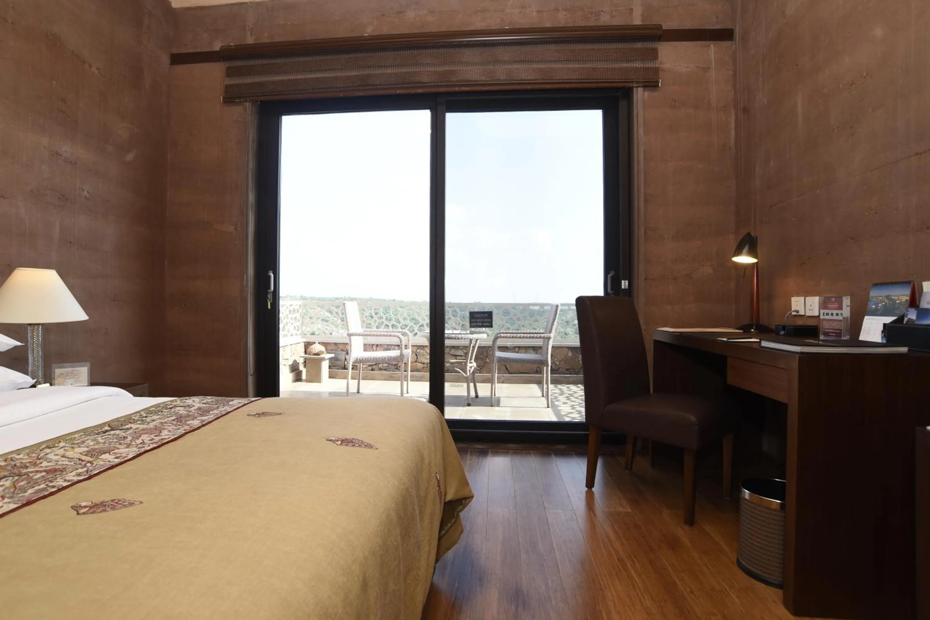 Photo of the whole room, Bed in The Lalit Mangar