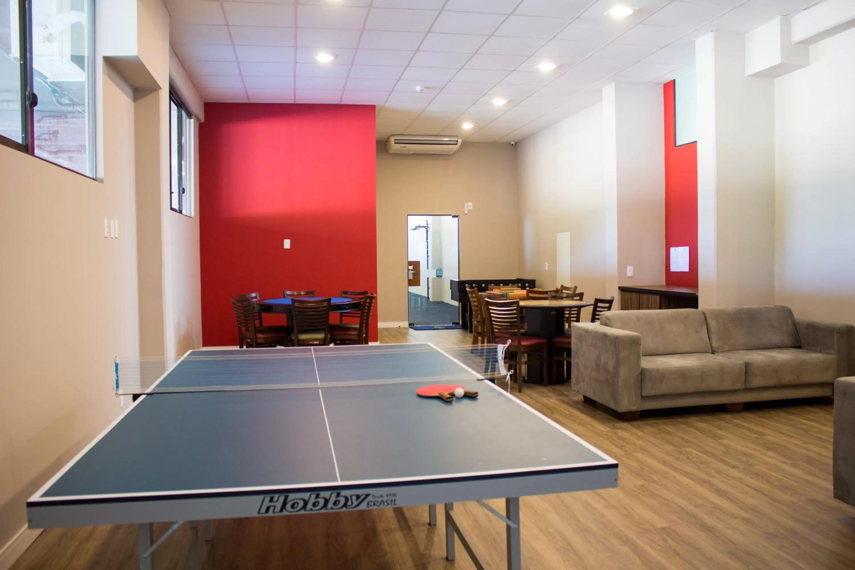 Communal lounge/ TV room in Hotel Estação 101 - Itajaí
