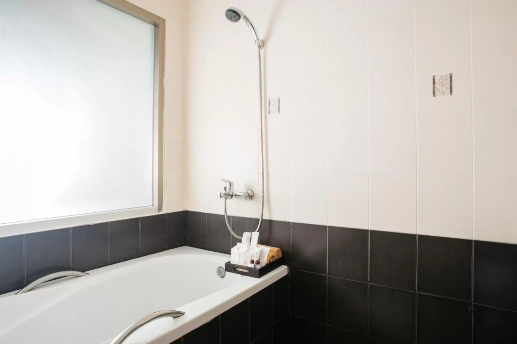 Bathroom in Diamond Park Inn Chiangrai & Resort