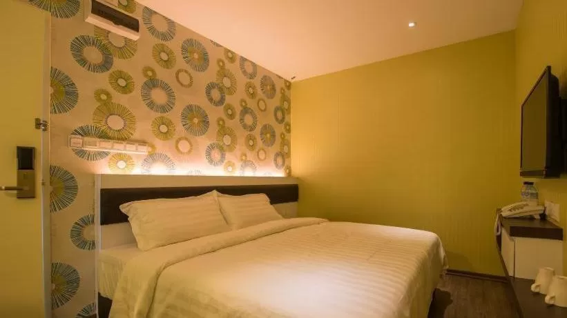 Bed in Riverfront Boutique Hotel