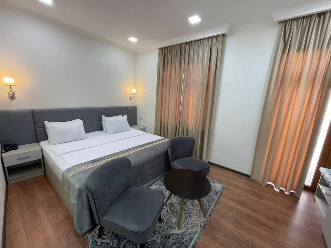 Bed in Registon Saroy Hotel