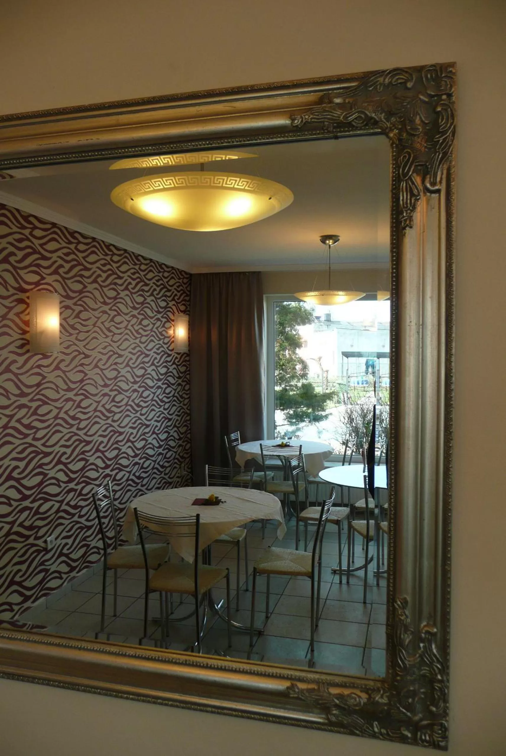 Communal lounge/ TV room in Pensjonat Landrynka