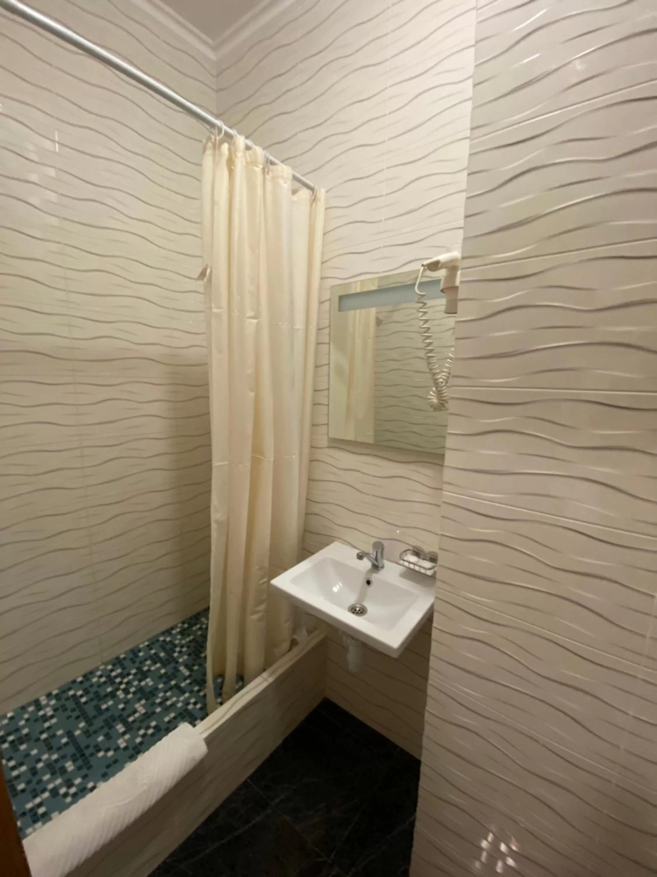 Bathroom in irisHotels