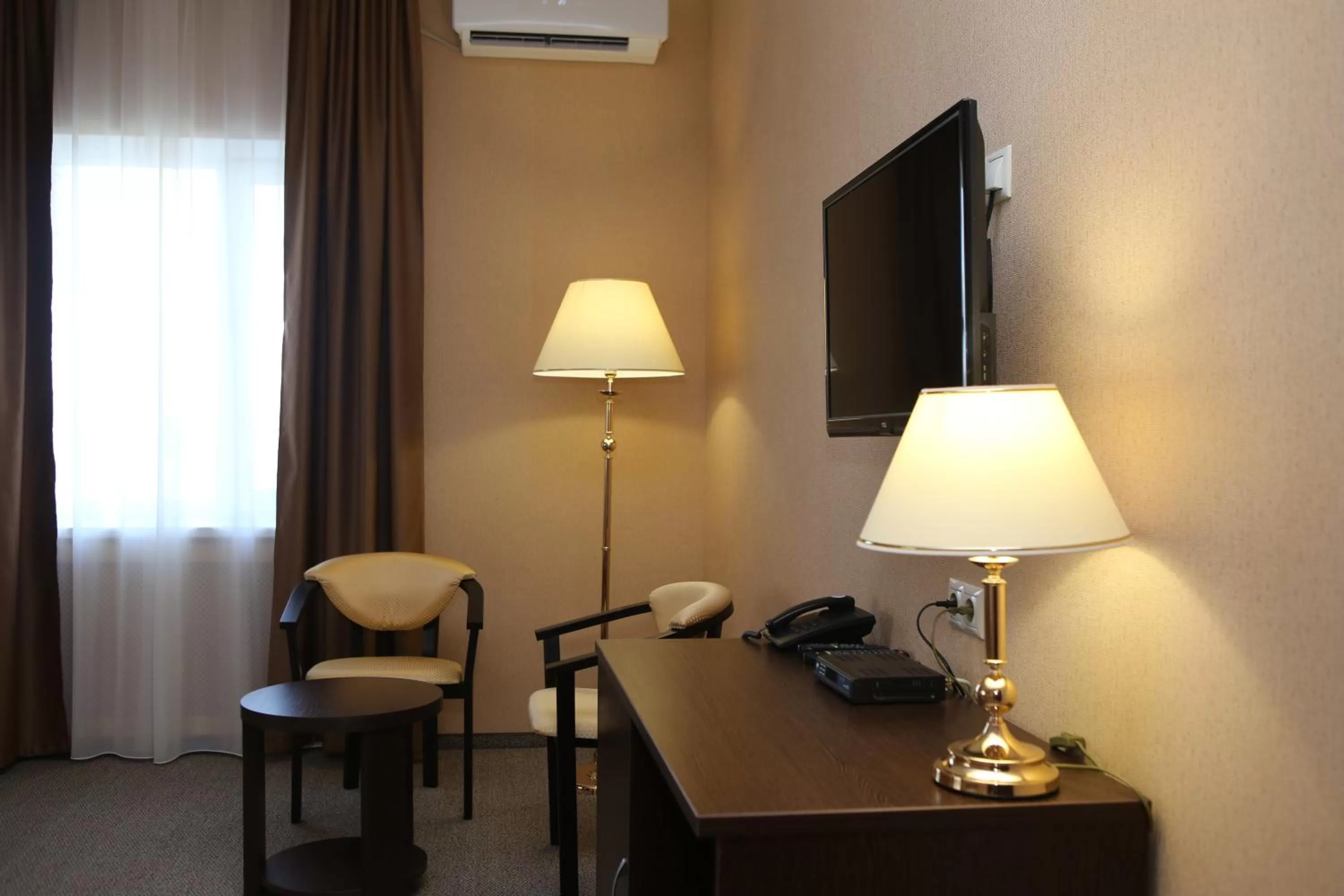 TV and multimedia, TV/Entertainment Center in Hotel Aner