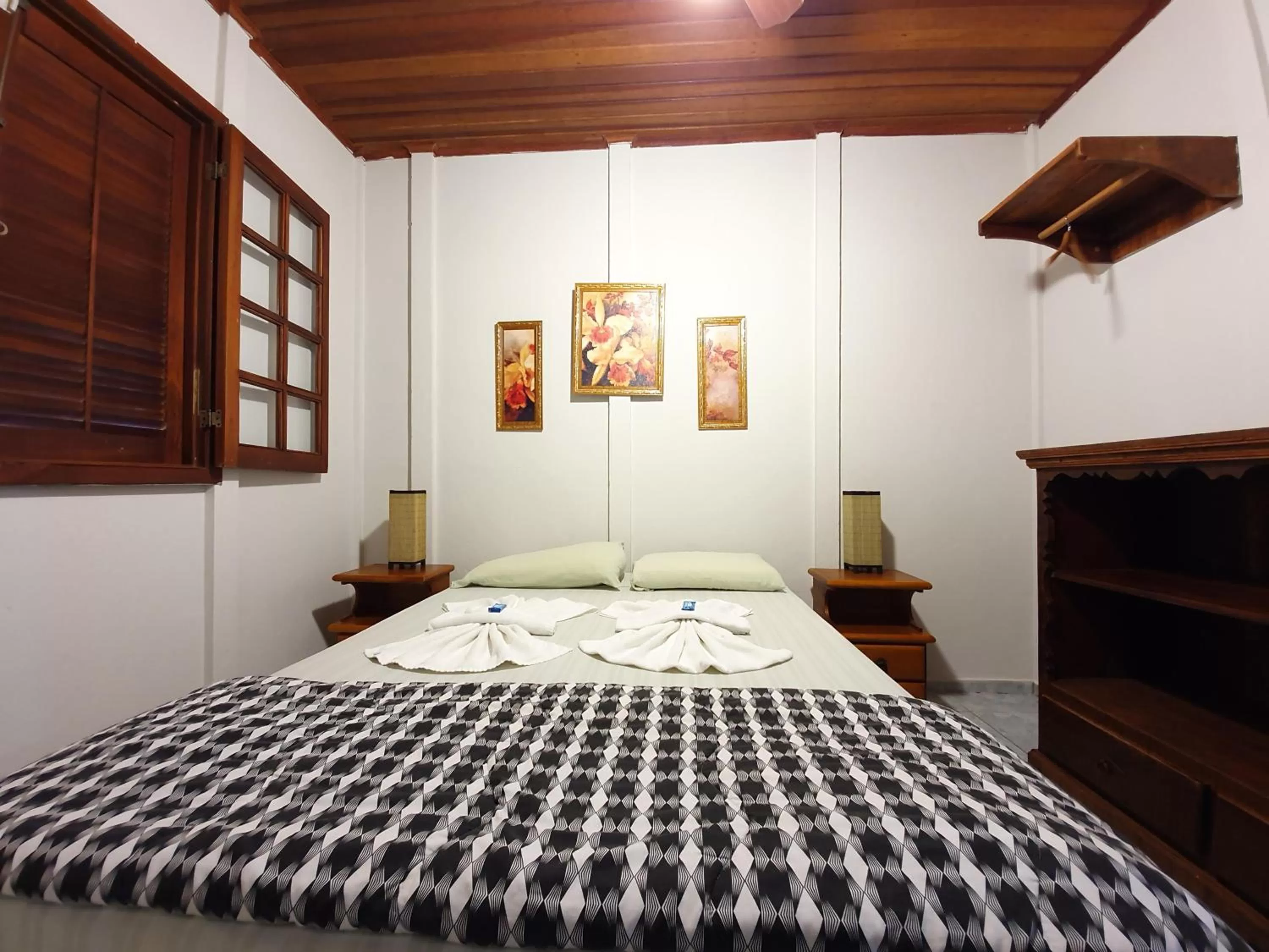 Bed in Pousada Canto do Curió Paraty