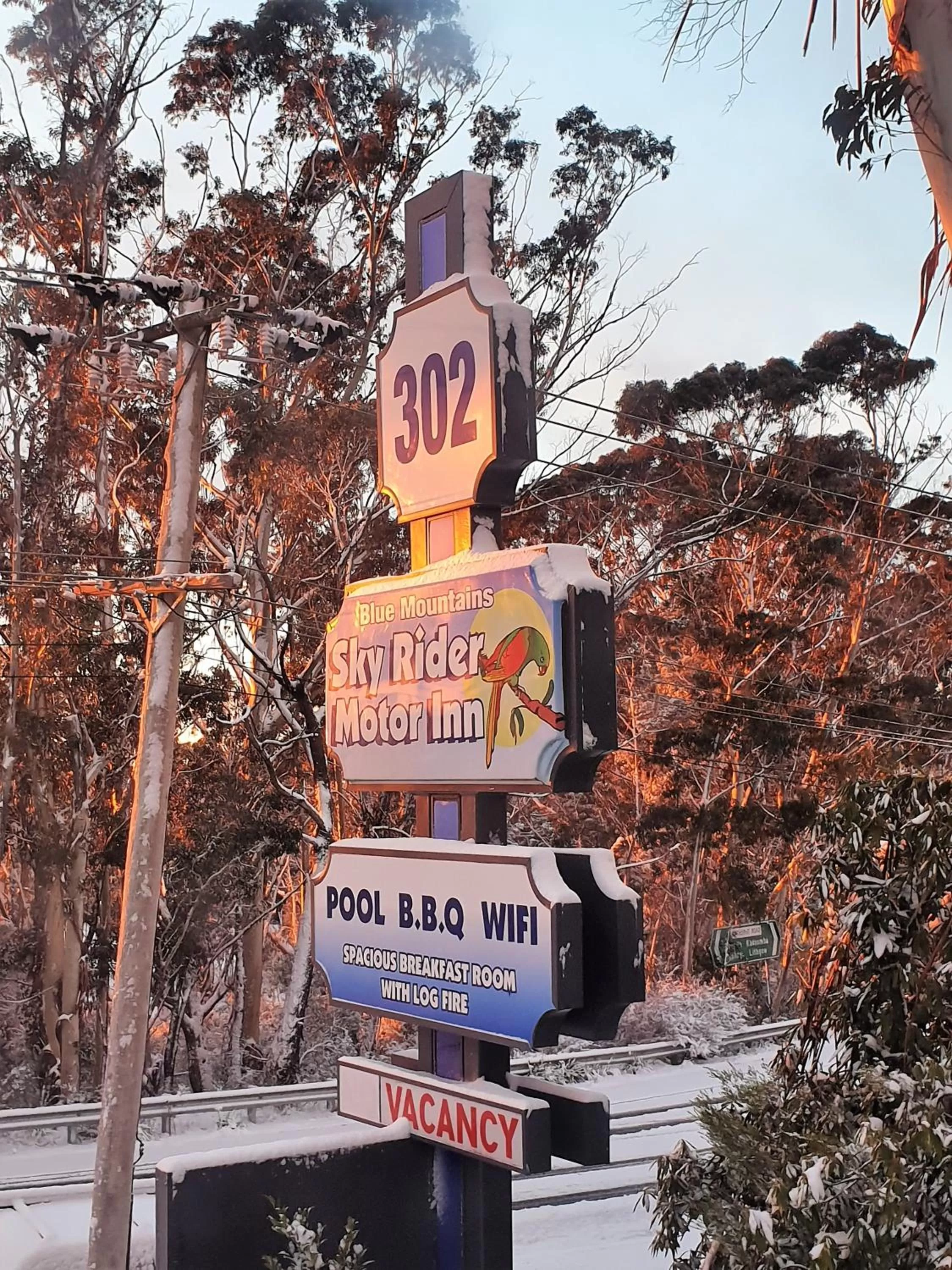 Property logo or sign in Sky Rider Motor Inn