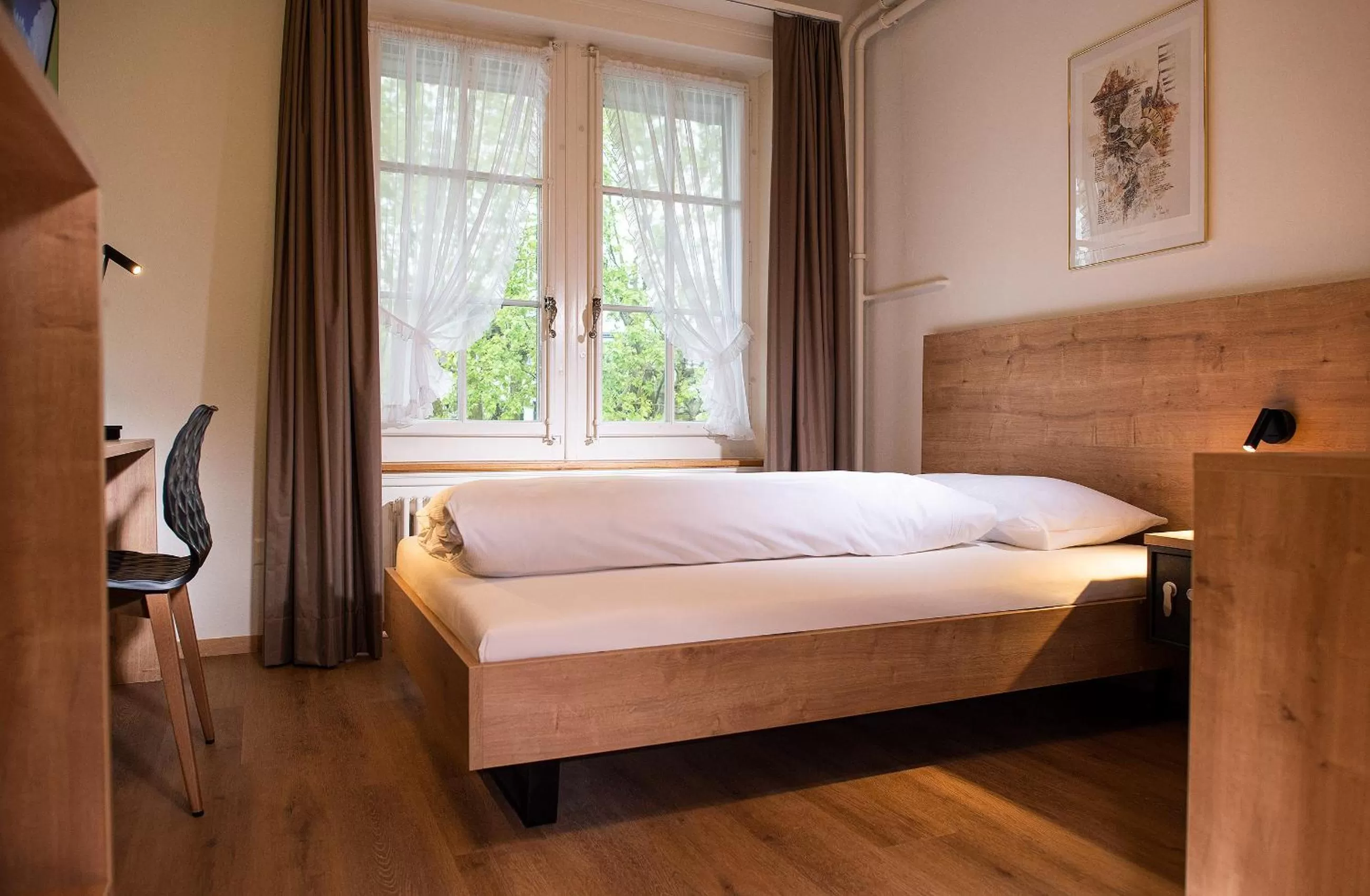 Bed in SEELANDHOTEL Weisses Kreuz