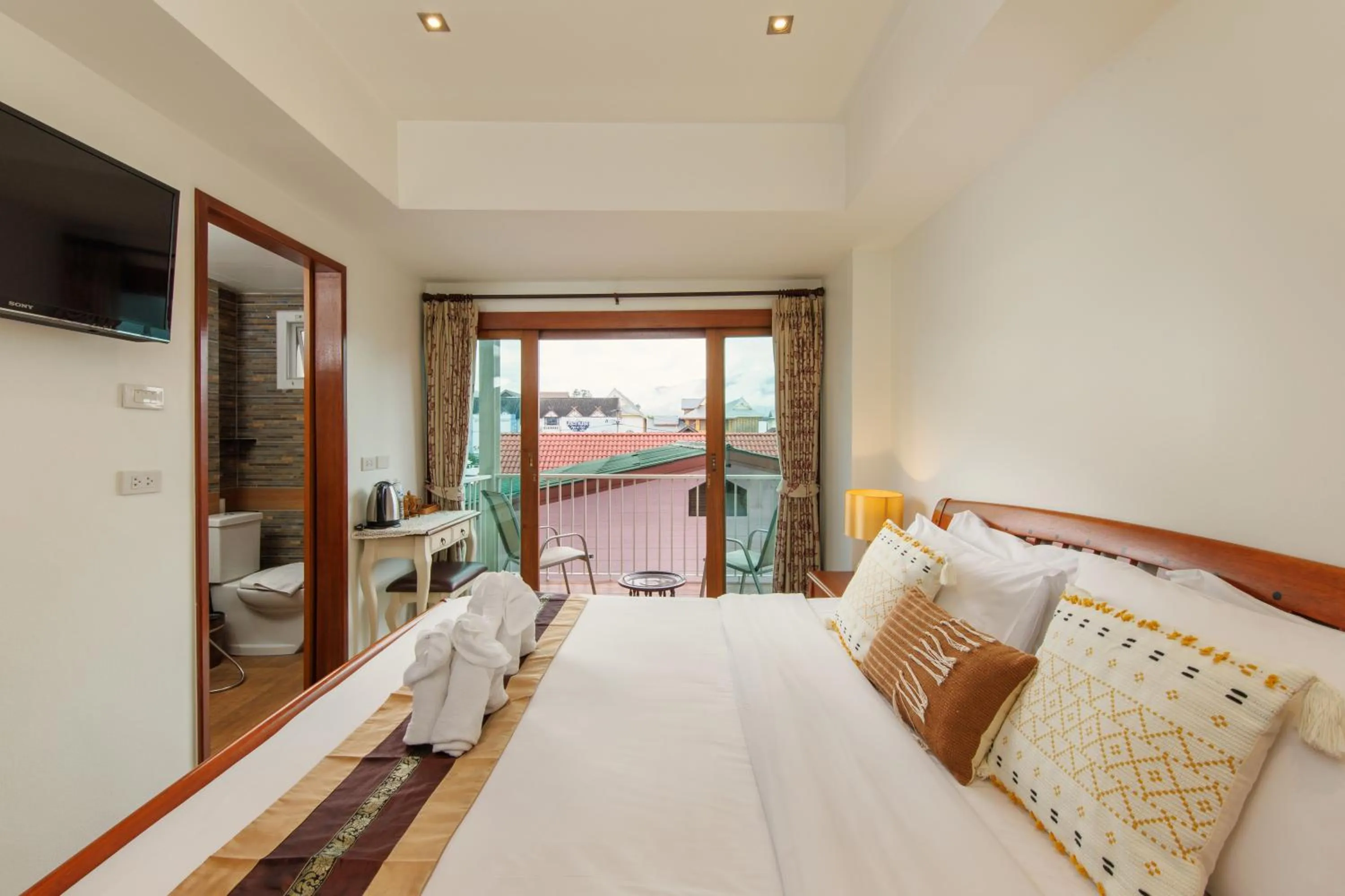 Bed in Rendezvous Classic House