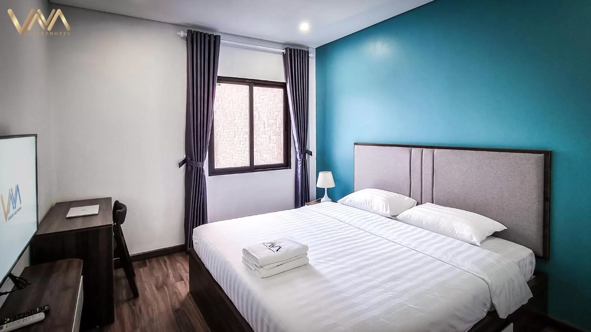 Bed in VNAHOMES APARTHOTEL