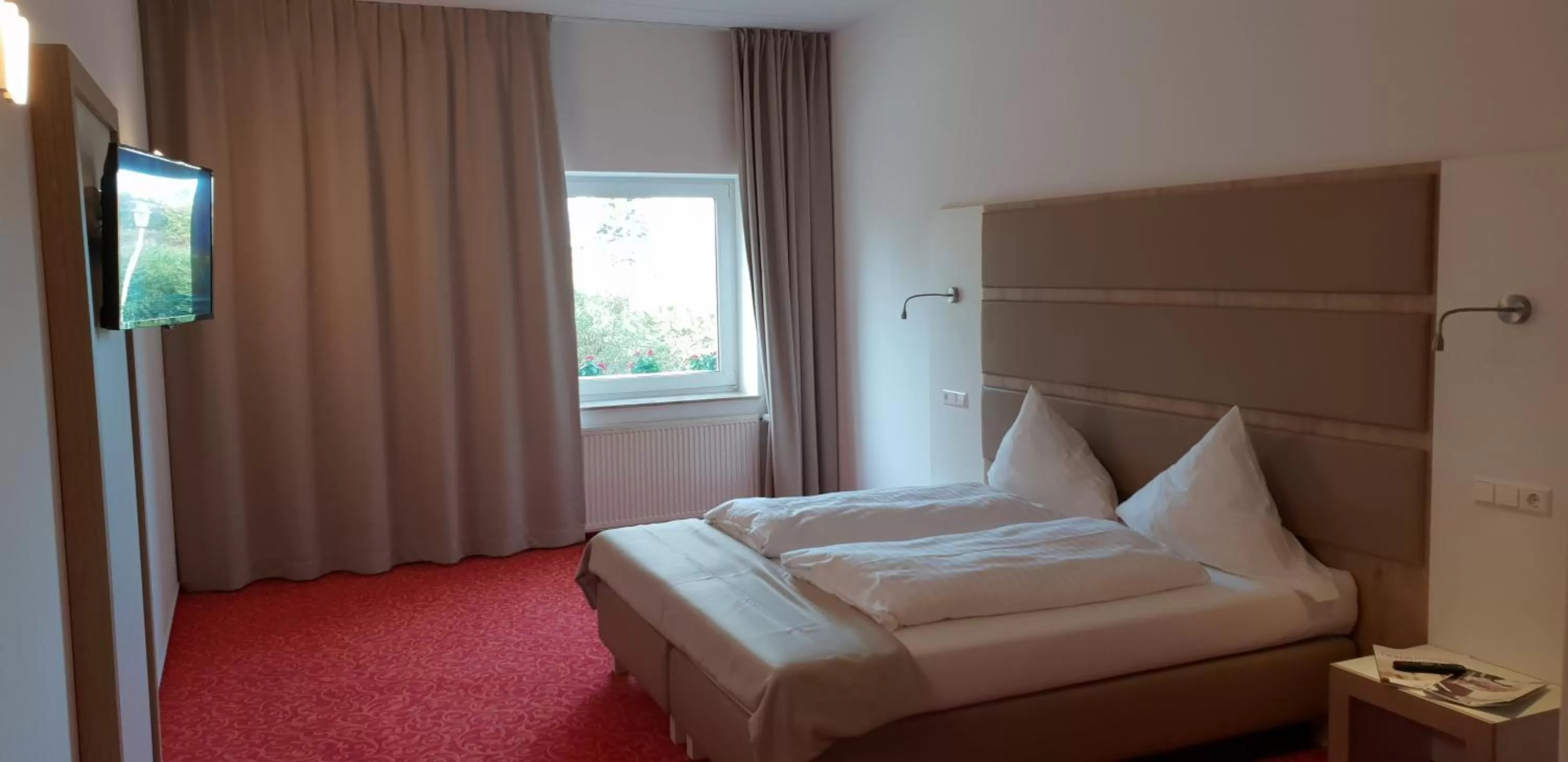 Bed in Confour Hotel